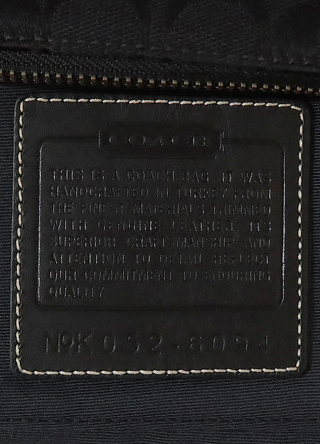 SIGNATURE DEMI POCHETTE BAG