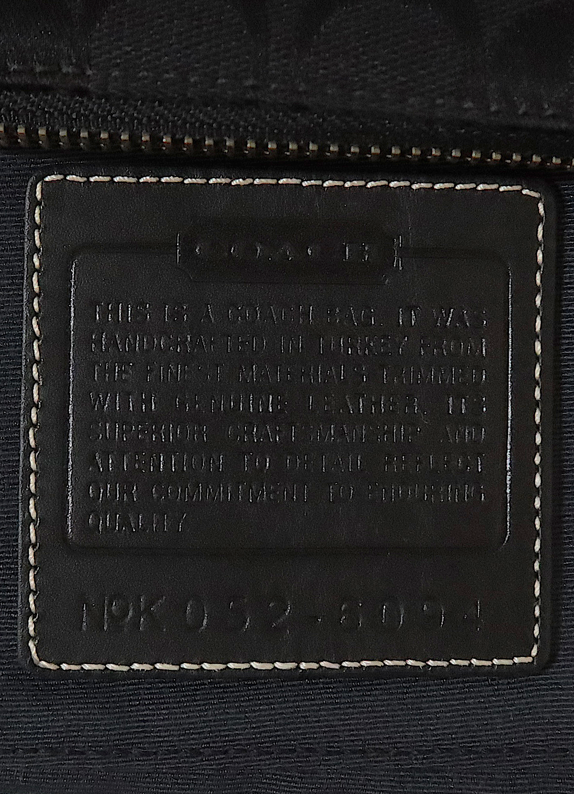 SIGNATURE DEMI POCHETTE BAG