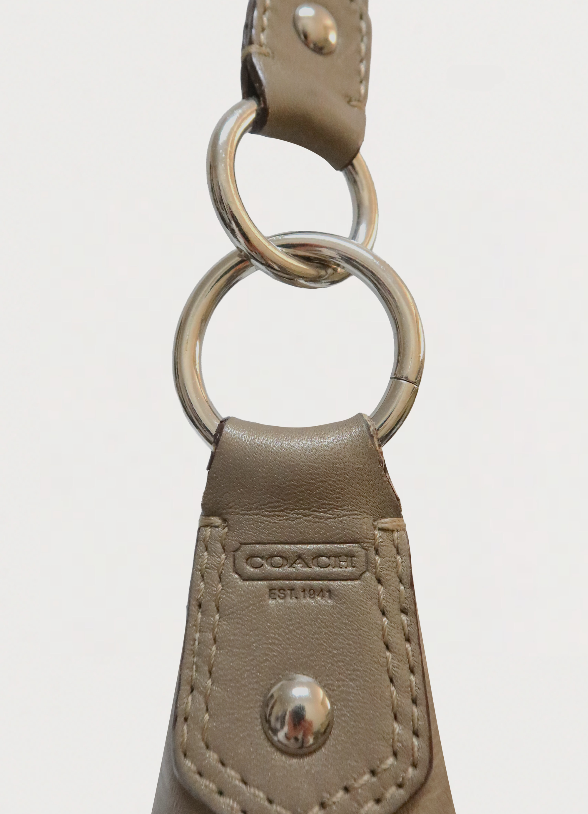 STITCHED SIGNATURE METALLIC HOBO SHOULDER BAG