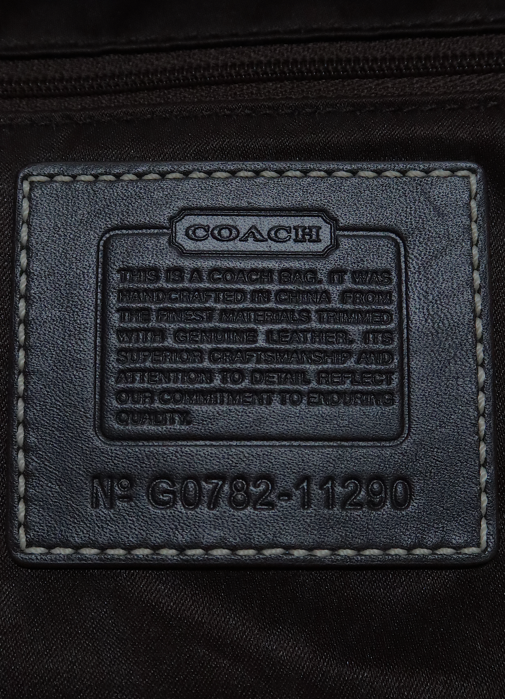 SIGNATURE ERGO HOBO BAG