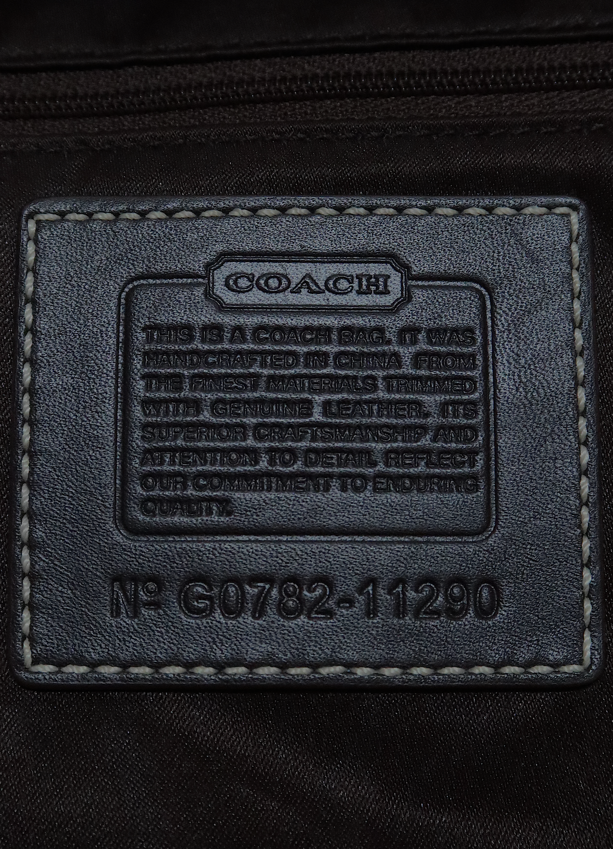 SIGNATURE ERGO HOBO BAG