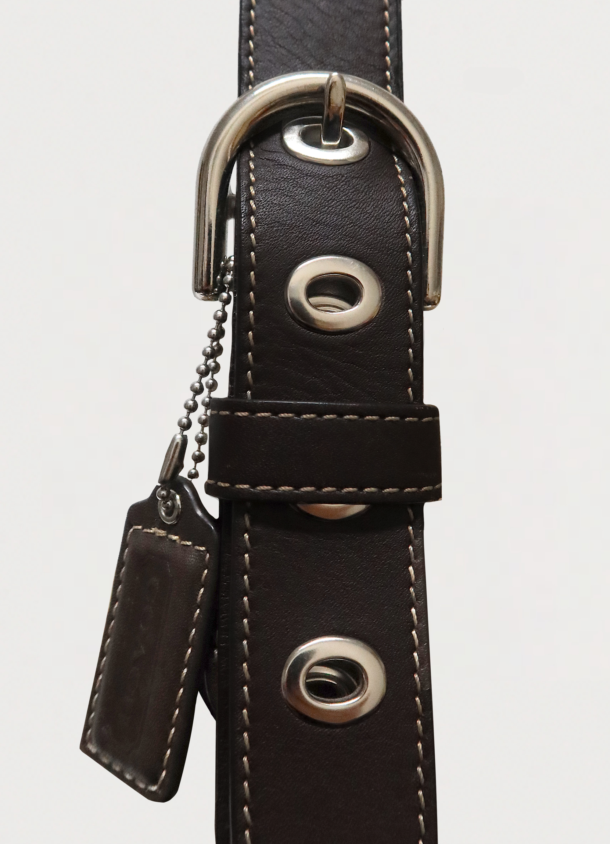 SIGNATURE DUFFLE CONVERTIBLE HOBO BAG