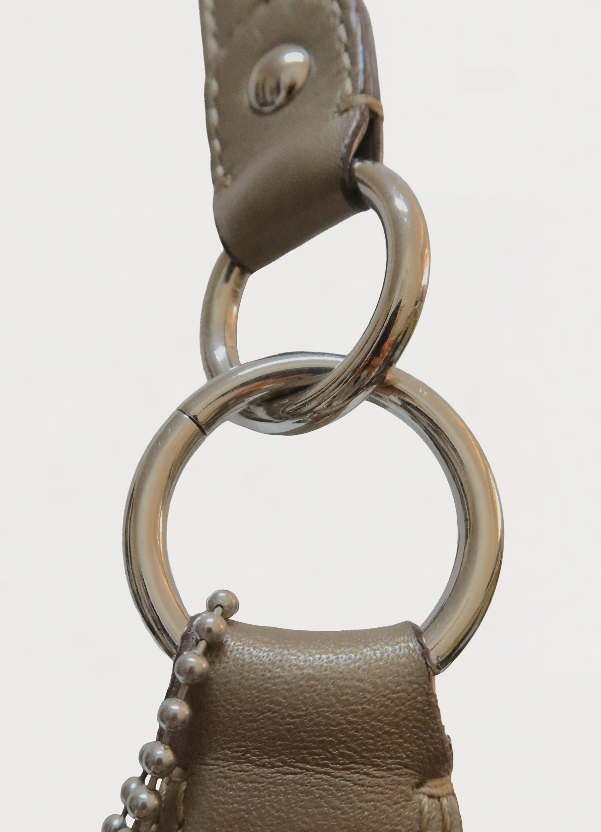 STITCHED SIGNATURE METALLIC HOBO SHOULDER BAG
