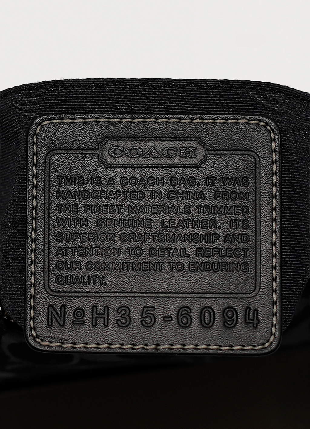 DEMI MONOGRAM POCHETTE BAG