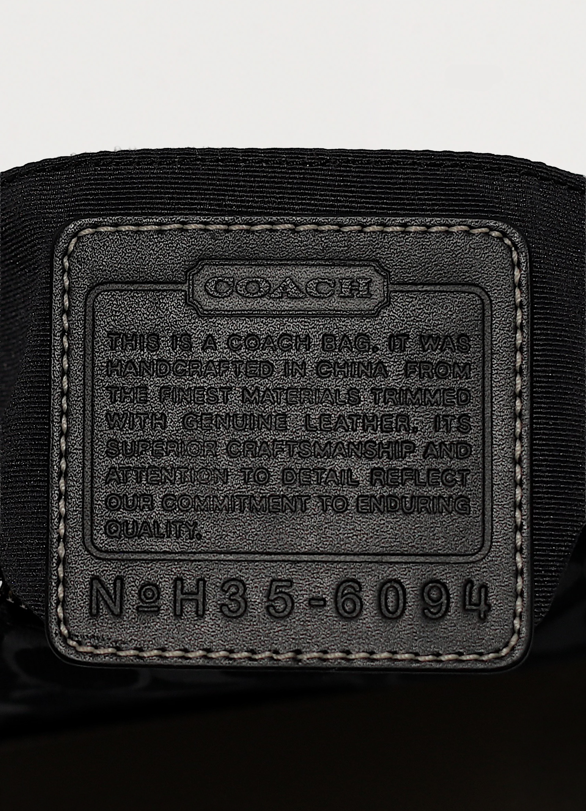DEMI MONOGRAM POCHETTE BAG