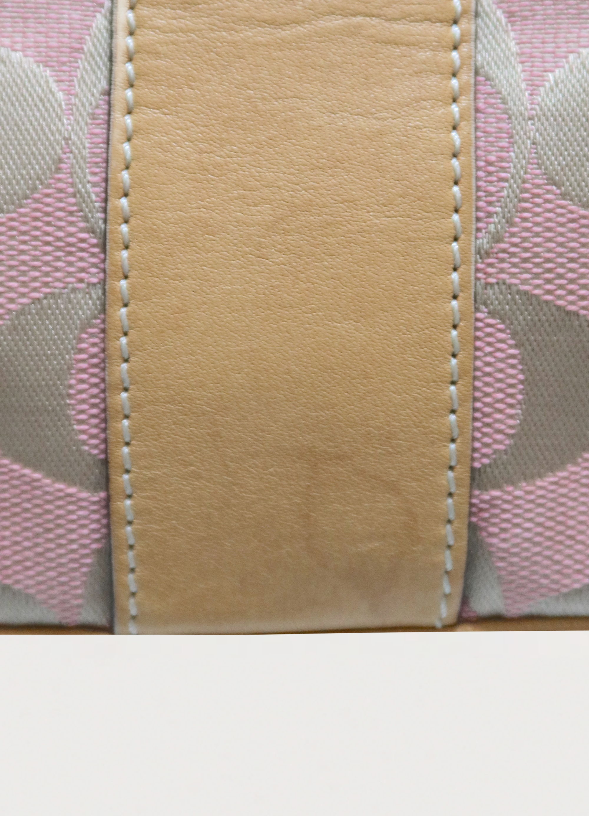 SIGNATURE CANVAS AND LEATHER SHOULDER BAG