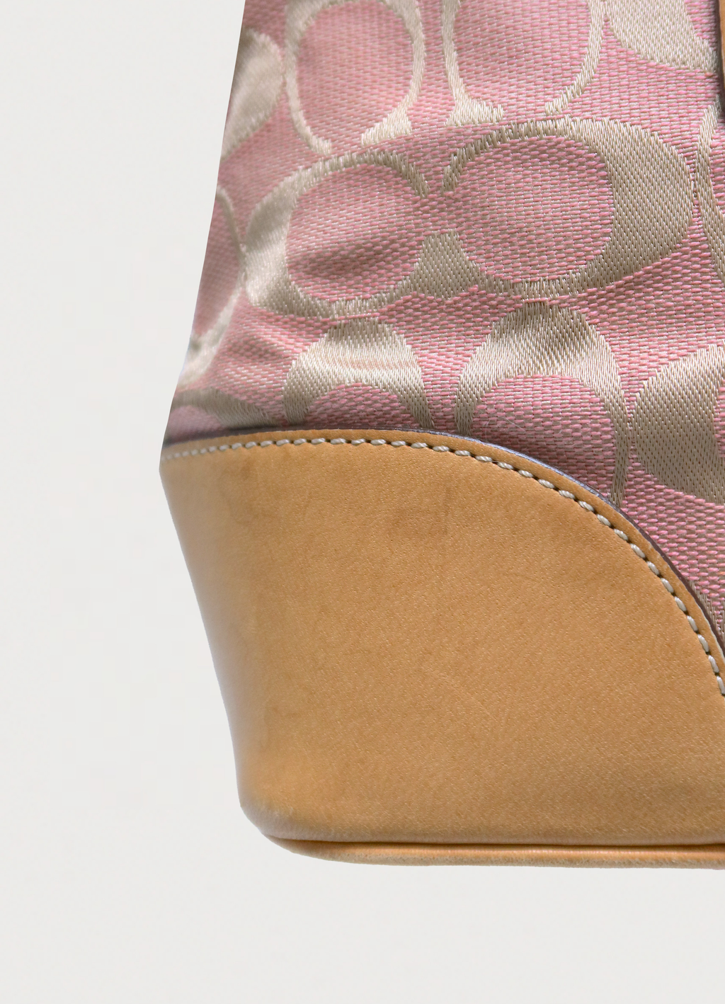 SIGNATURE CANVAS AND LEATHER SHOULDER BAG