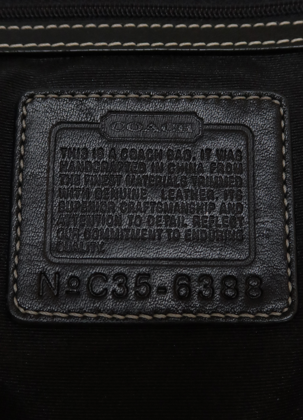 SIGNATURE SOHO FLAP SHOULDER BAG
