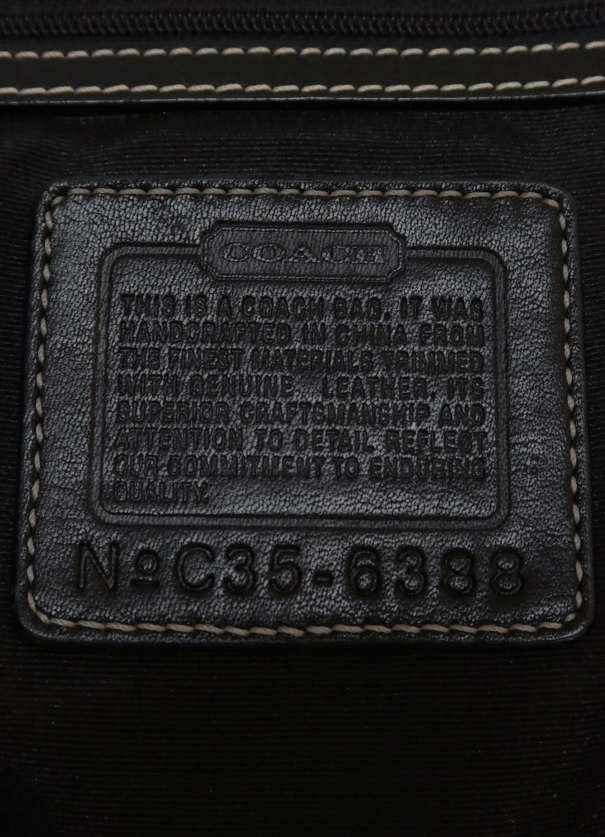 SIGNATURE SOHO FLAP SHOULDER BAG