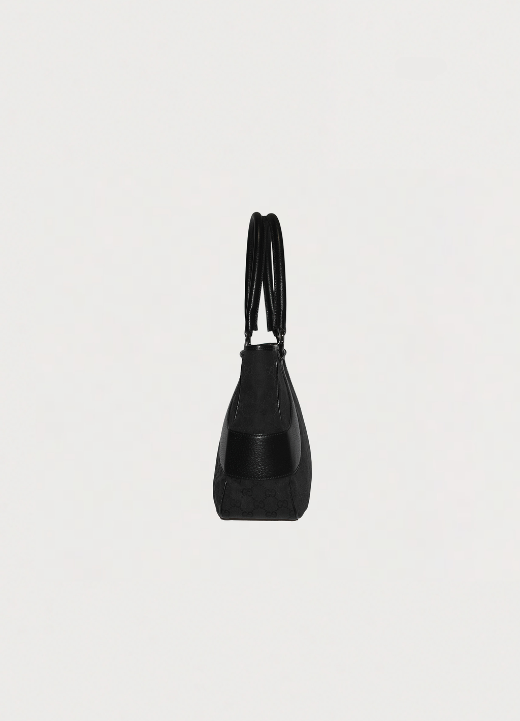 Gucci GG Canvas Tote Bag in black canvas with leather trim showing left side