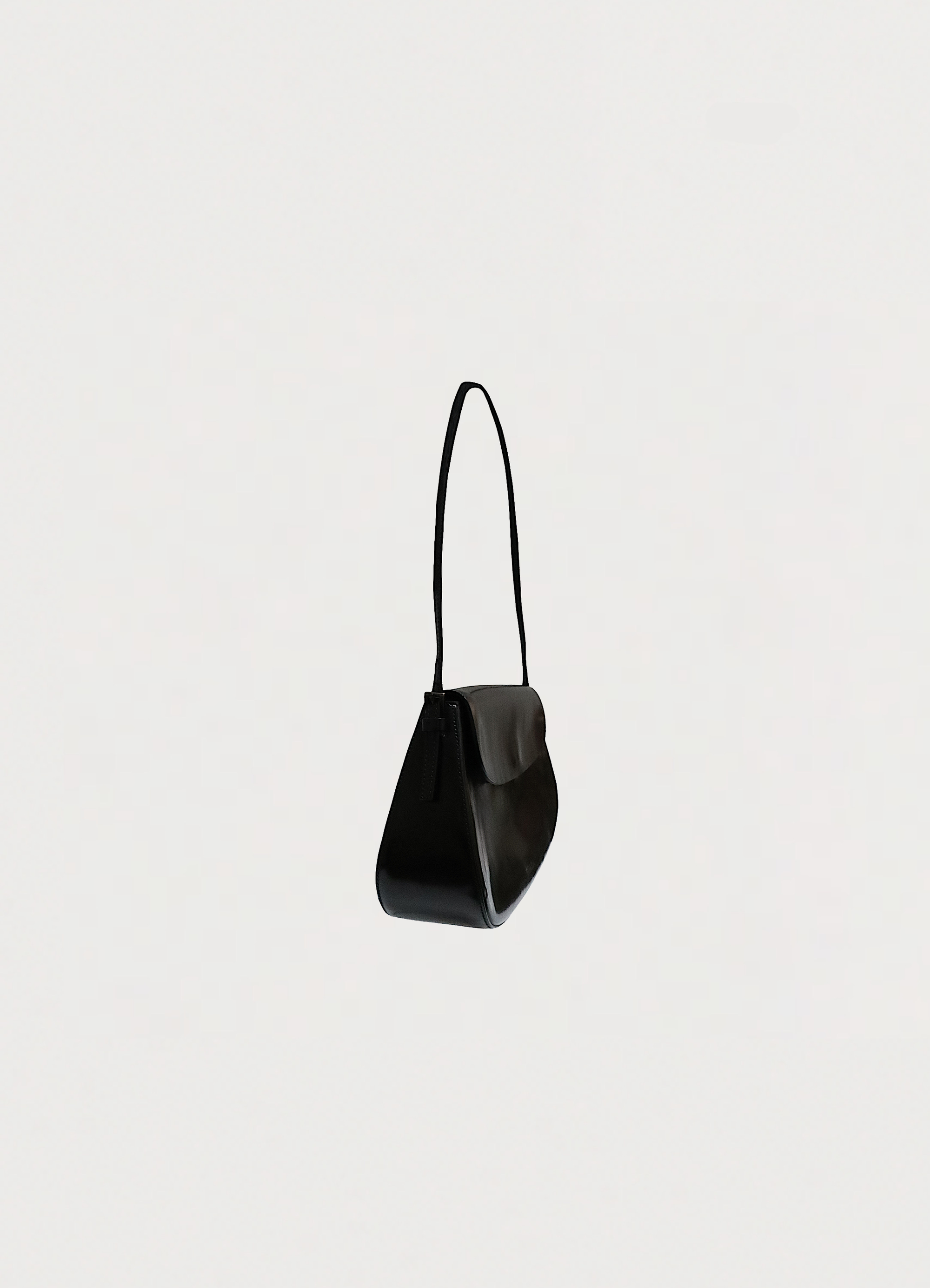 Vintage Prada Spazzolato Chic Shoulder Bag patent leather showing angled side