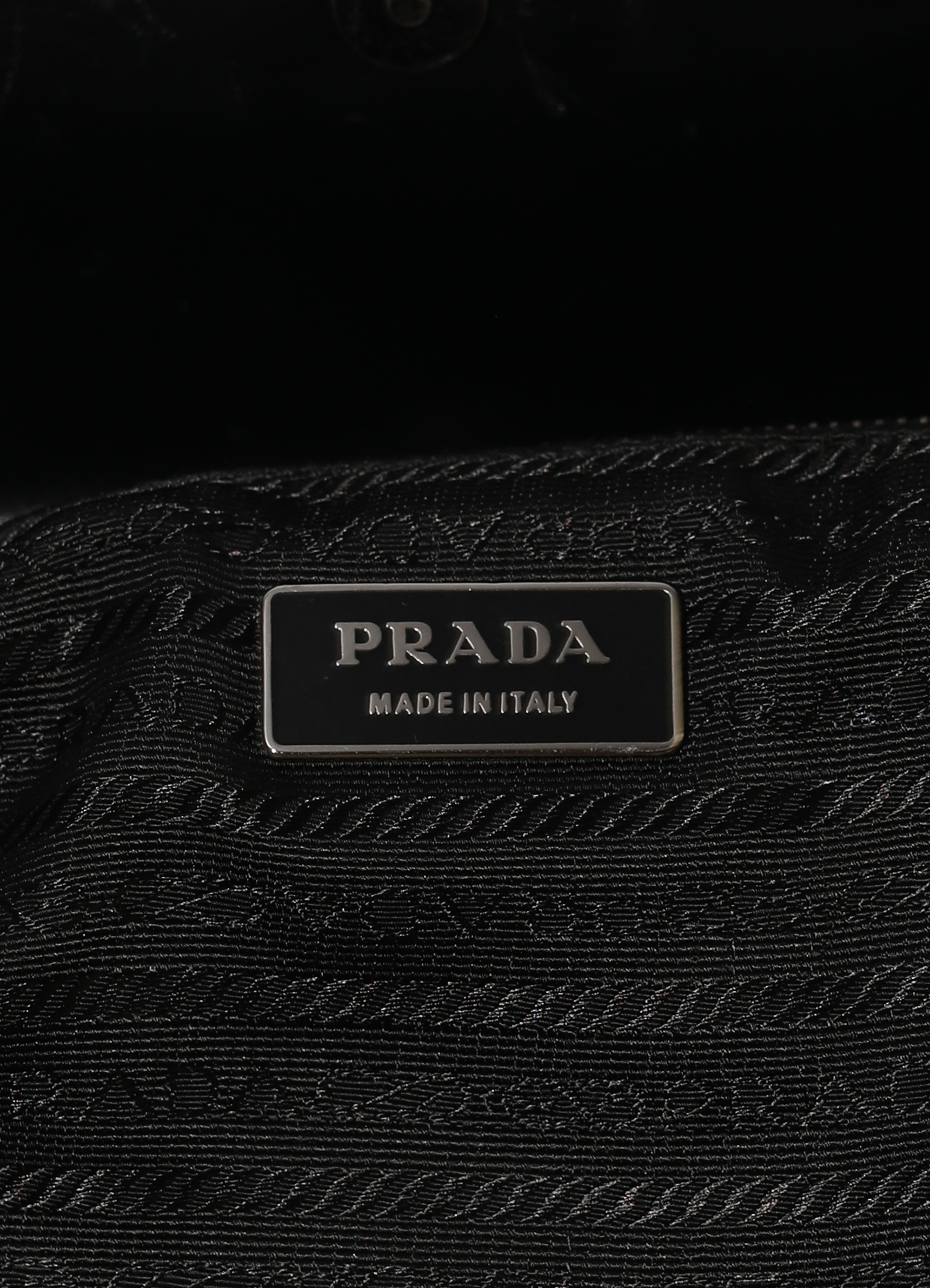 Vintage Prada Spazzolato Chic Shoulder Bag patent leather showing label plate