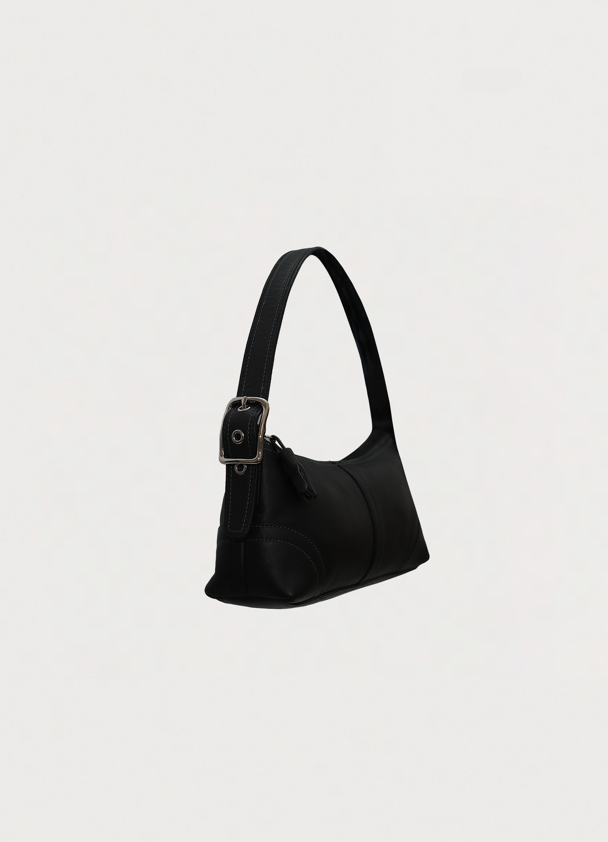 Vintage coach black east west demi leather baguette bag showing angled side