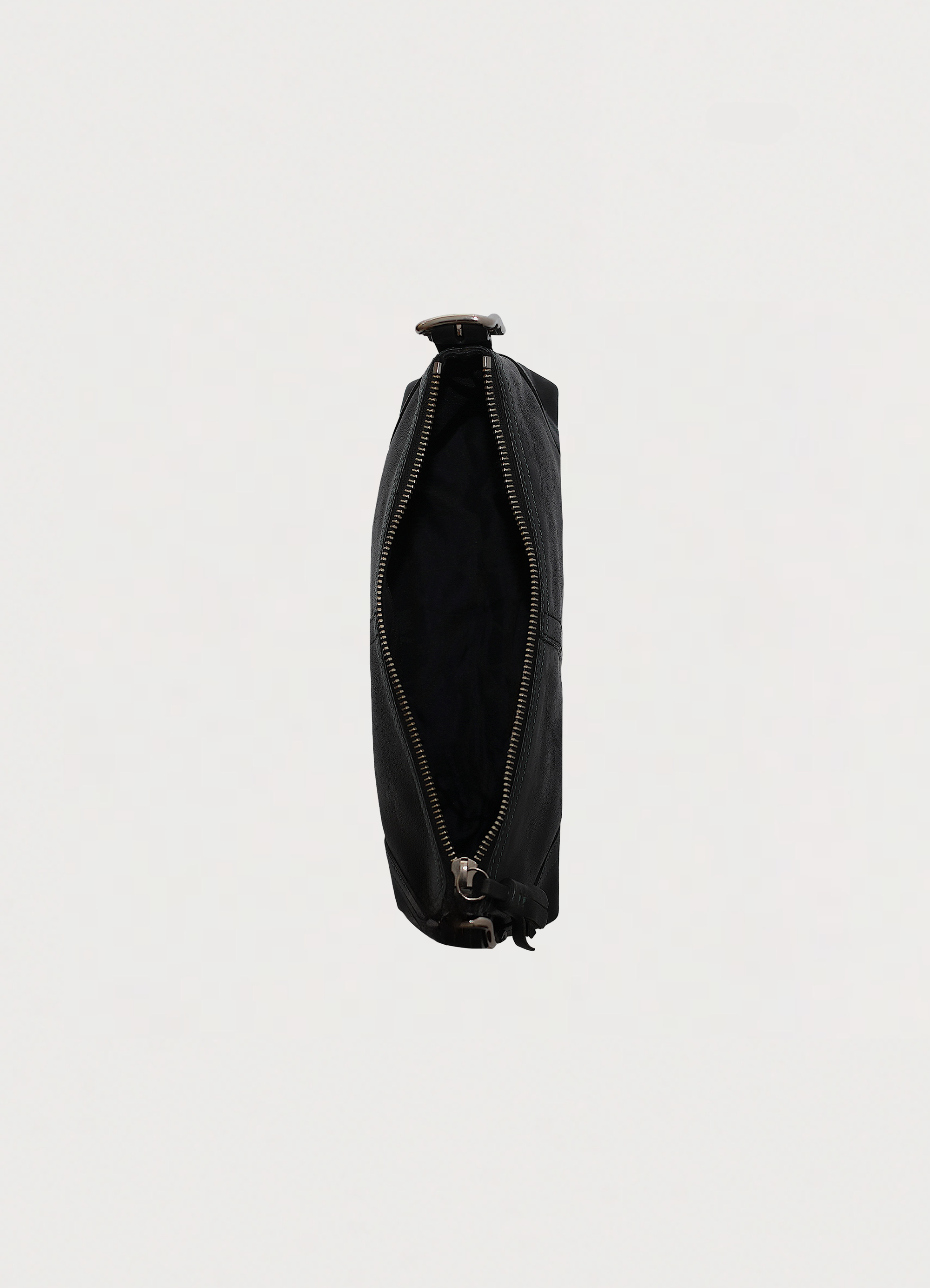 Vintage coach black east west demi leather baguette bag showing interior from top view down

