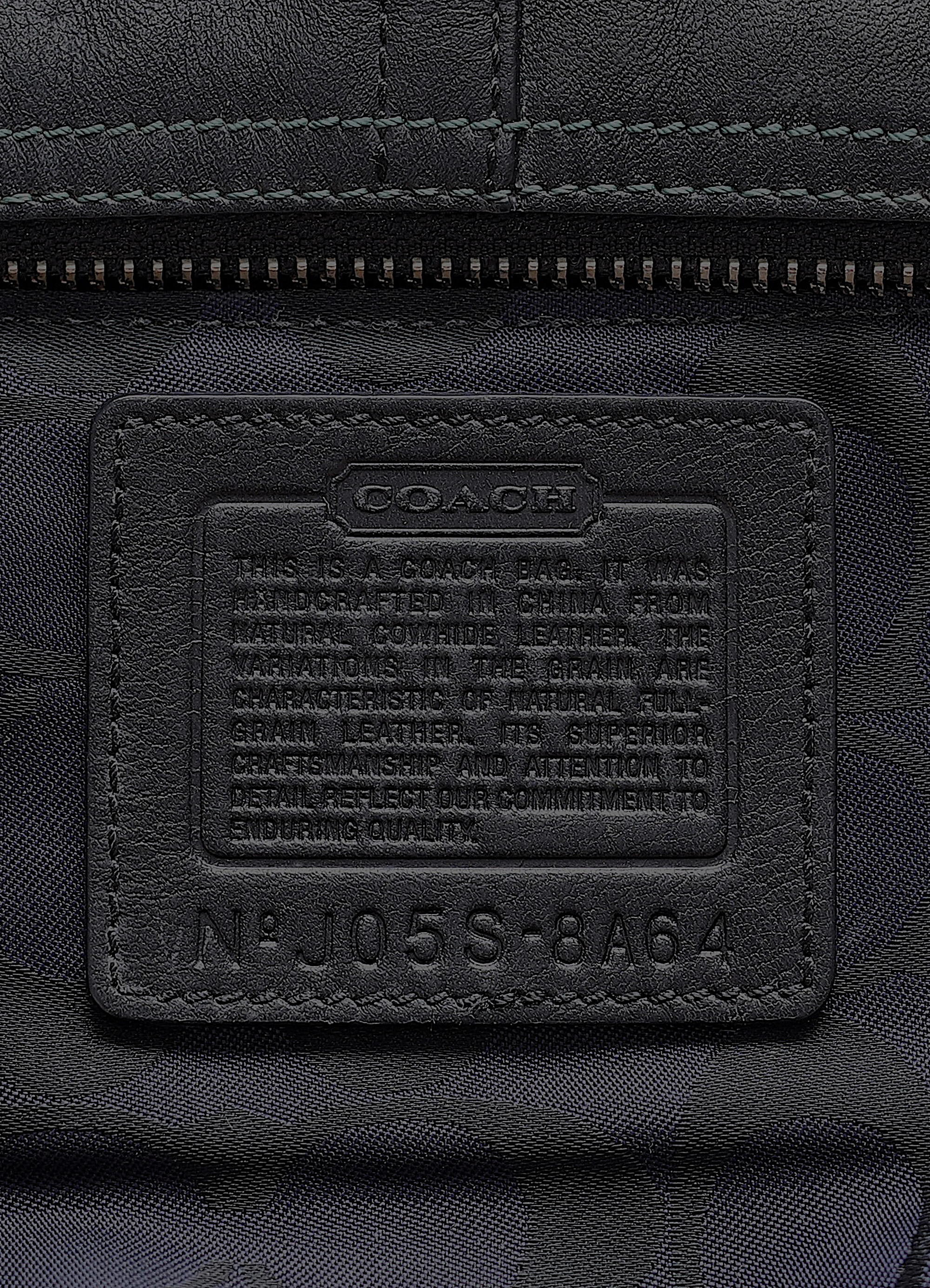 Vintage coach black east west demi leather baguette bag showing creed patch
