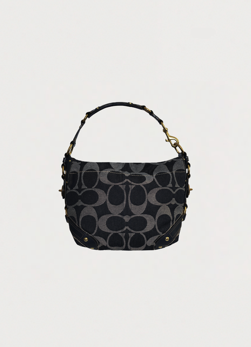 Vintage coach blue denim Carly monogram shoulder bag showing back
