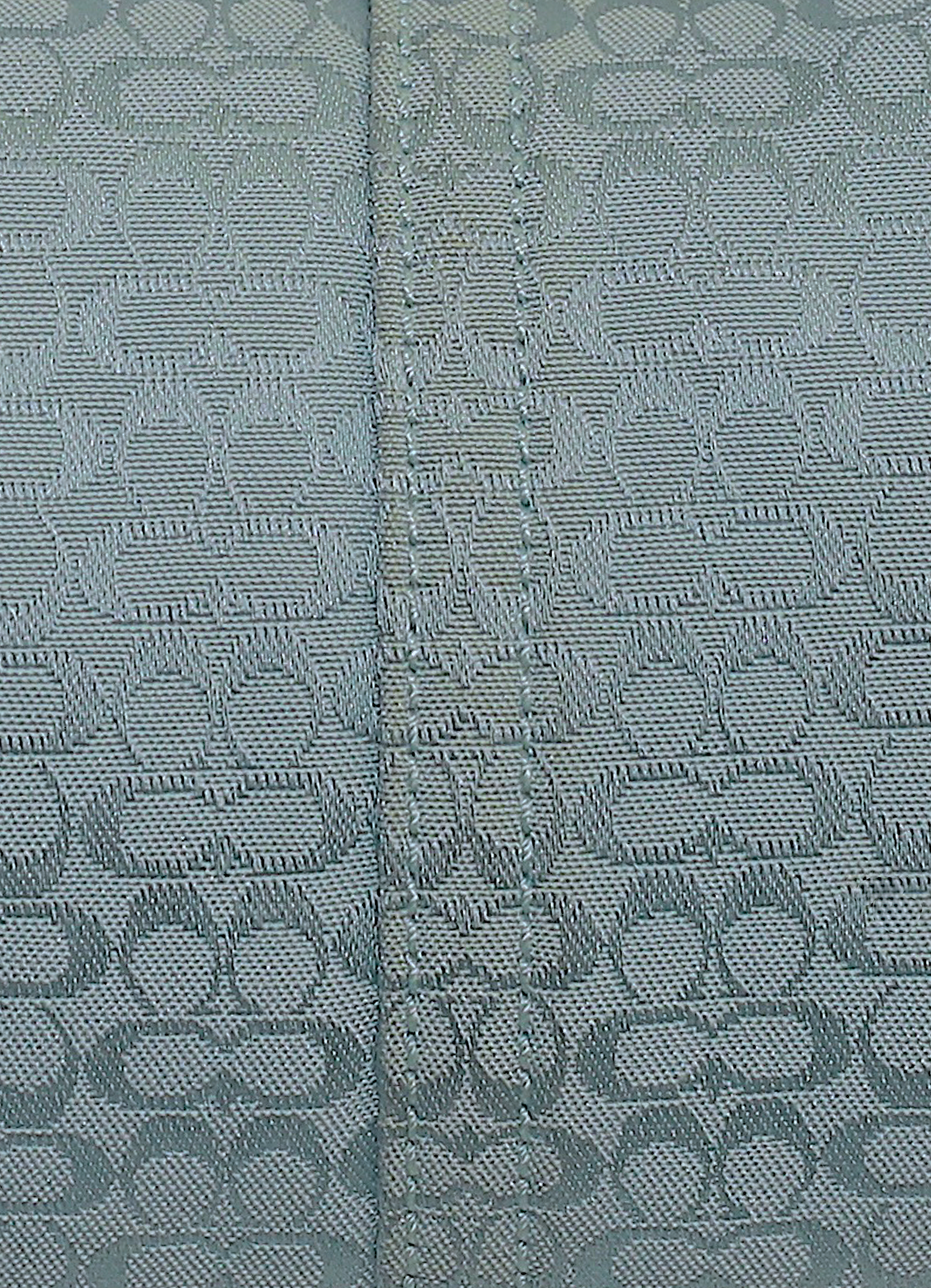 Vintage coach blue soho hobo monogram shoulder bag showing close up of print 