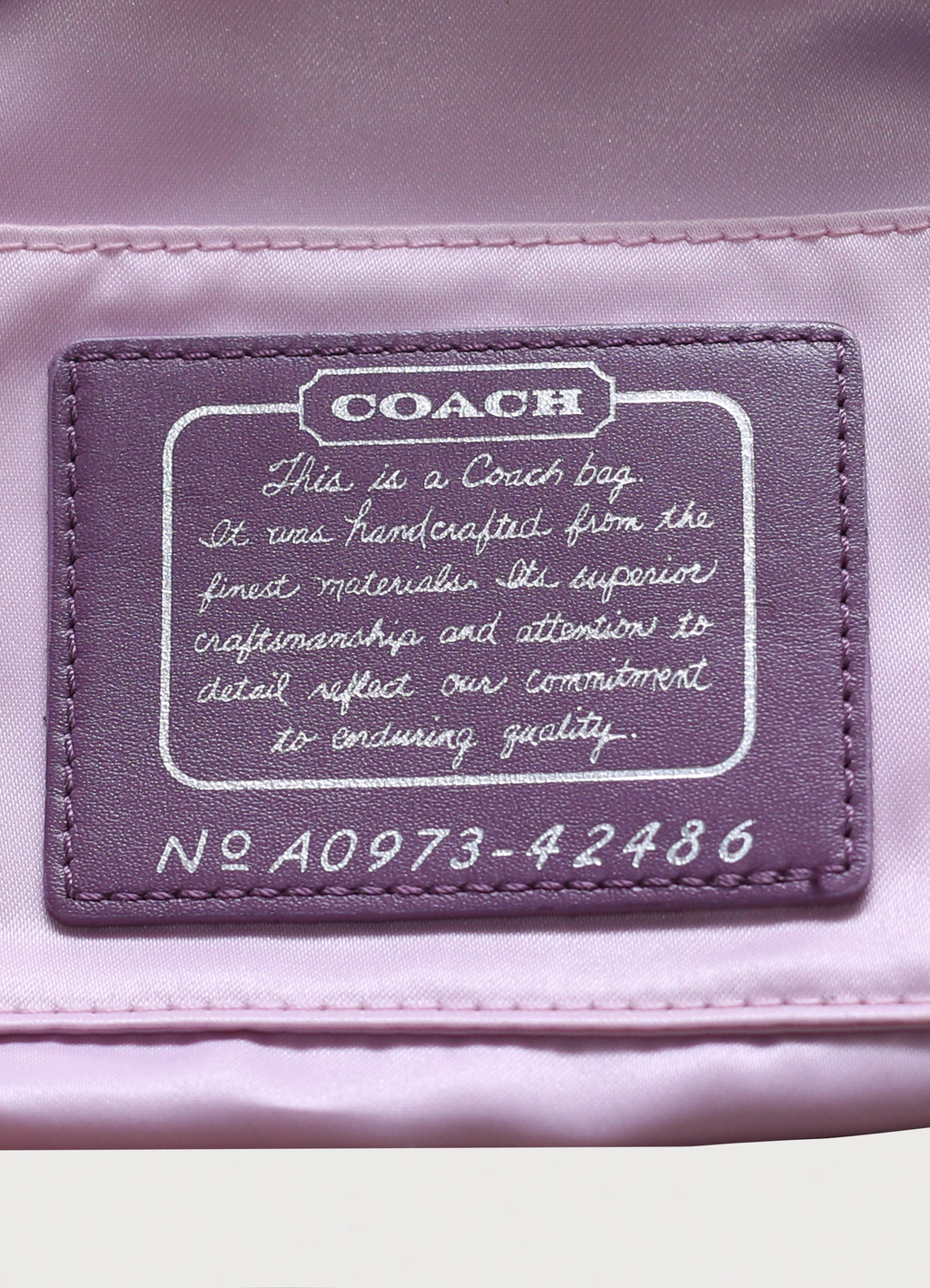 Vintage coach purple mixed op art monogram pochette bag showing creed patch