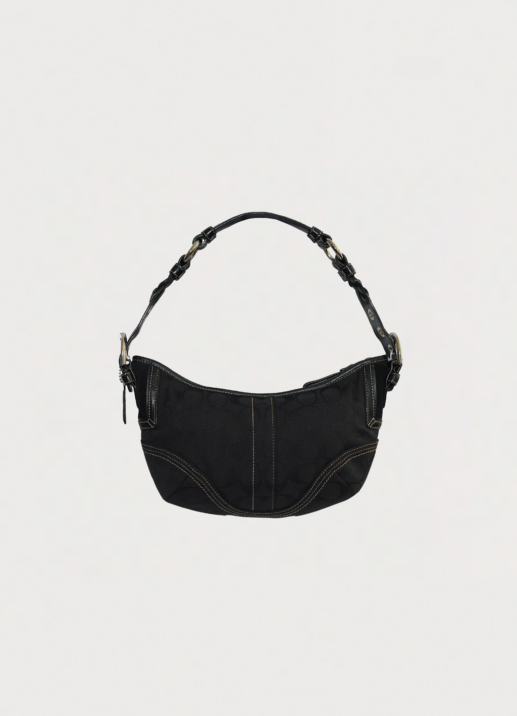 Vintage Coach Soho hobo bag in black signature canvas with leather trim showing back