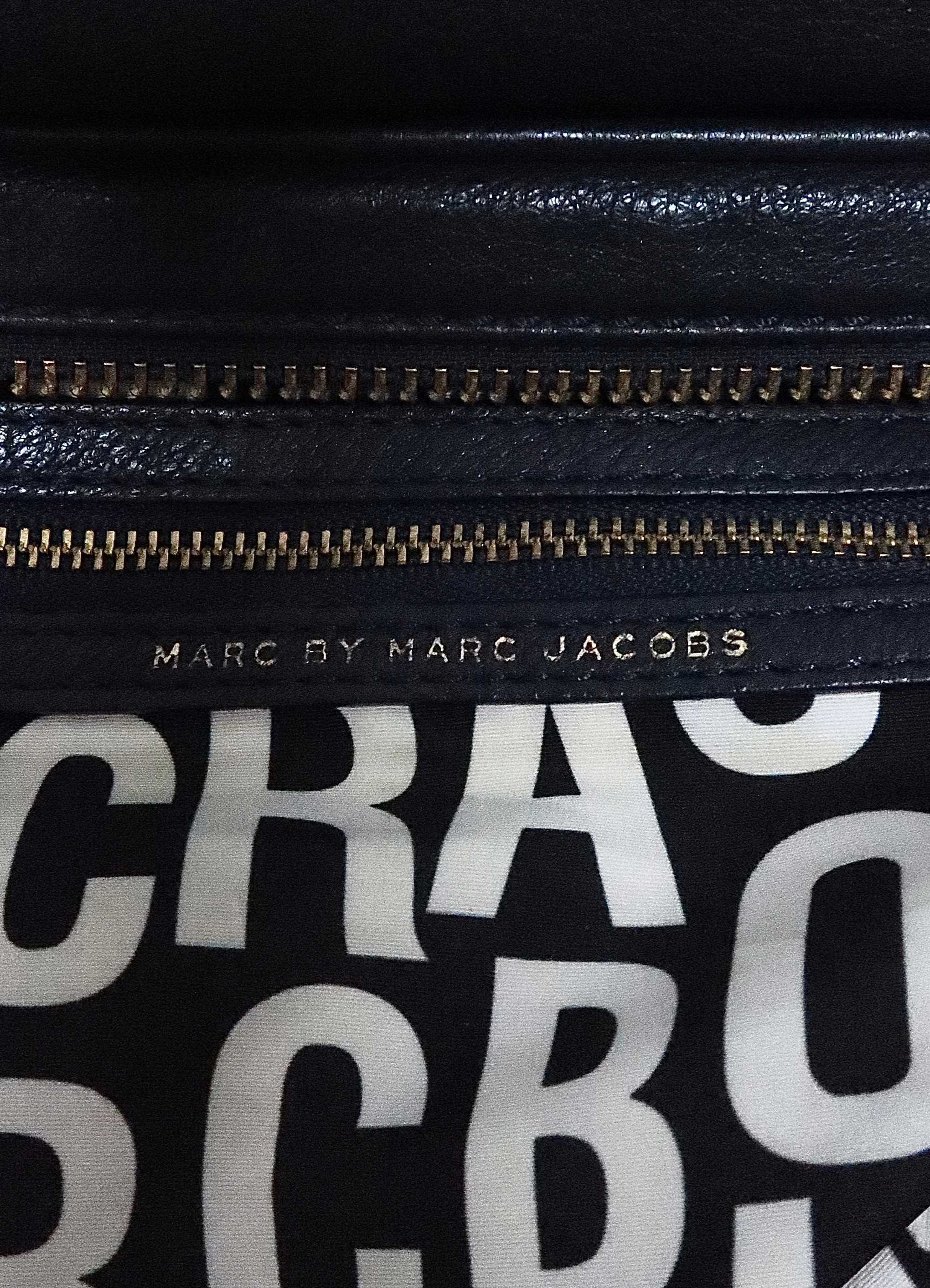 Vintage marc jacobs navy blue classic q baby groovee handbag showing close up of label