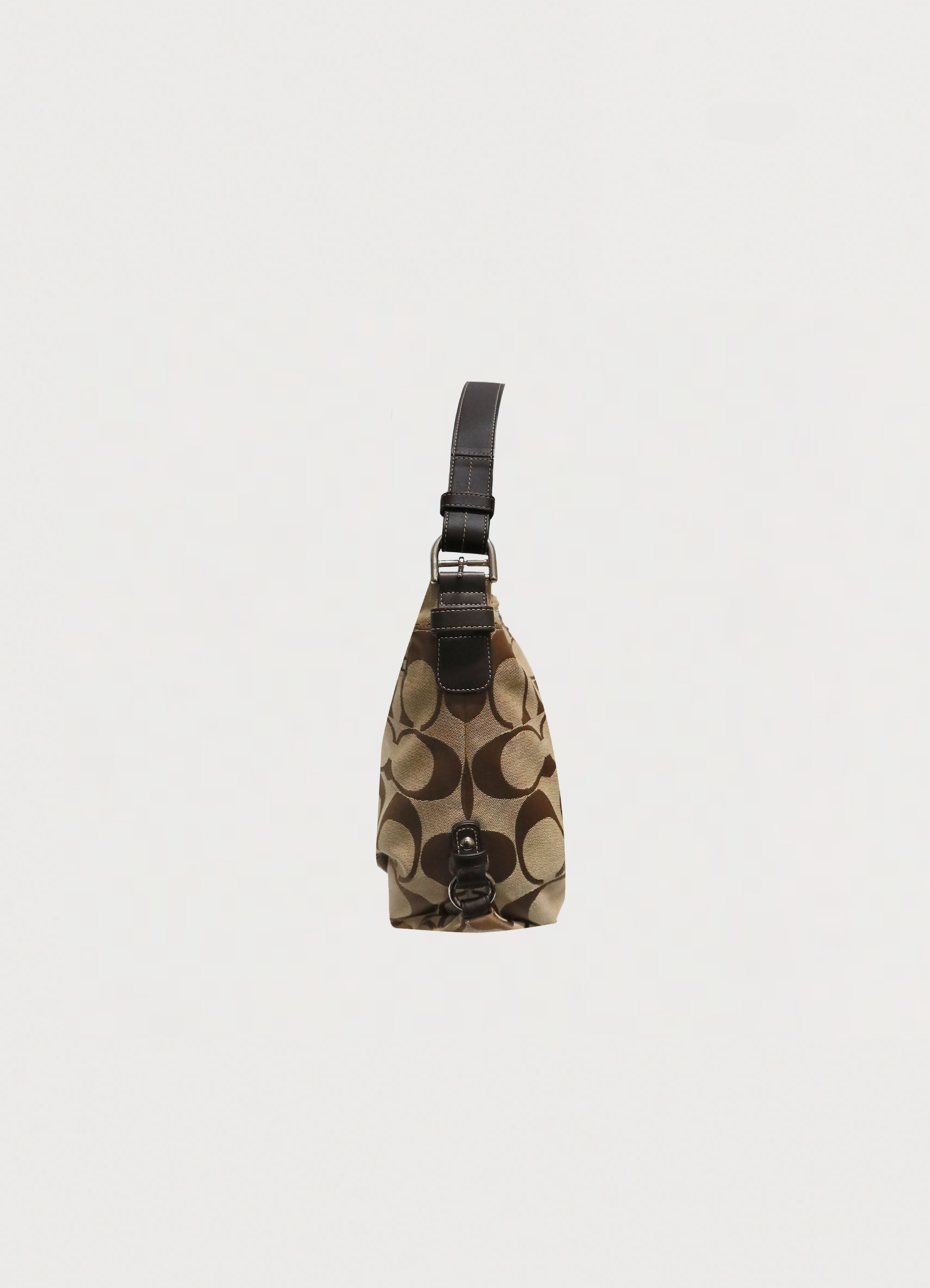 SIGNATURE DUFFLE CONVERTIBLE HOBO BAG