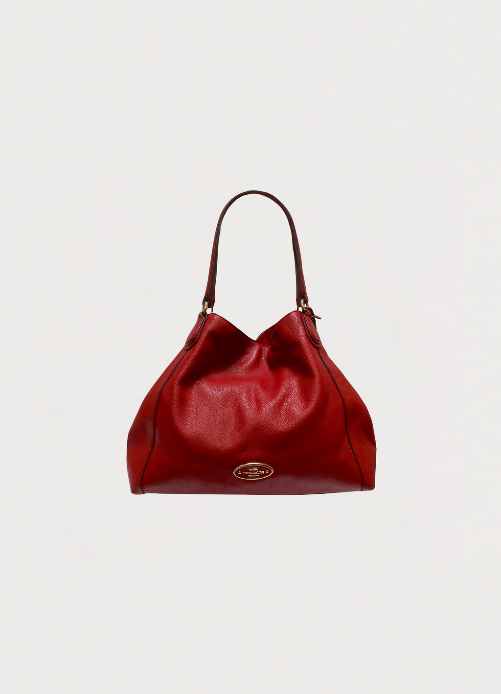 Front view of Coach Edie 31 shoulder bag in red polished pebble leather