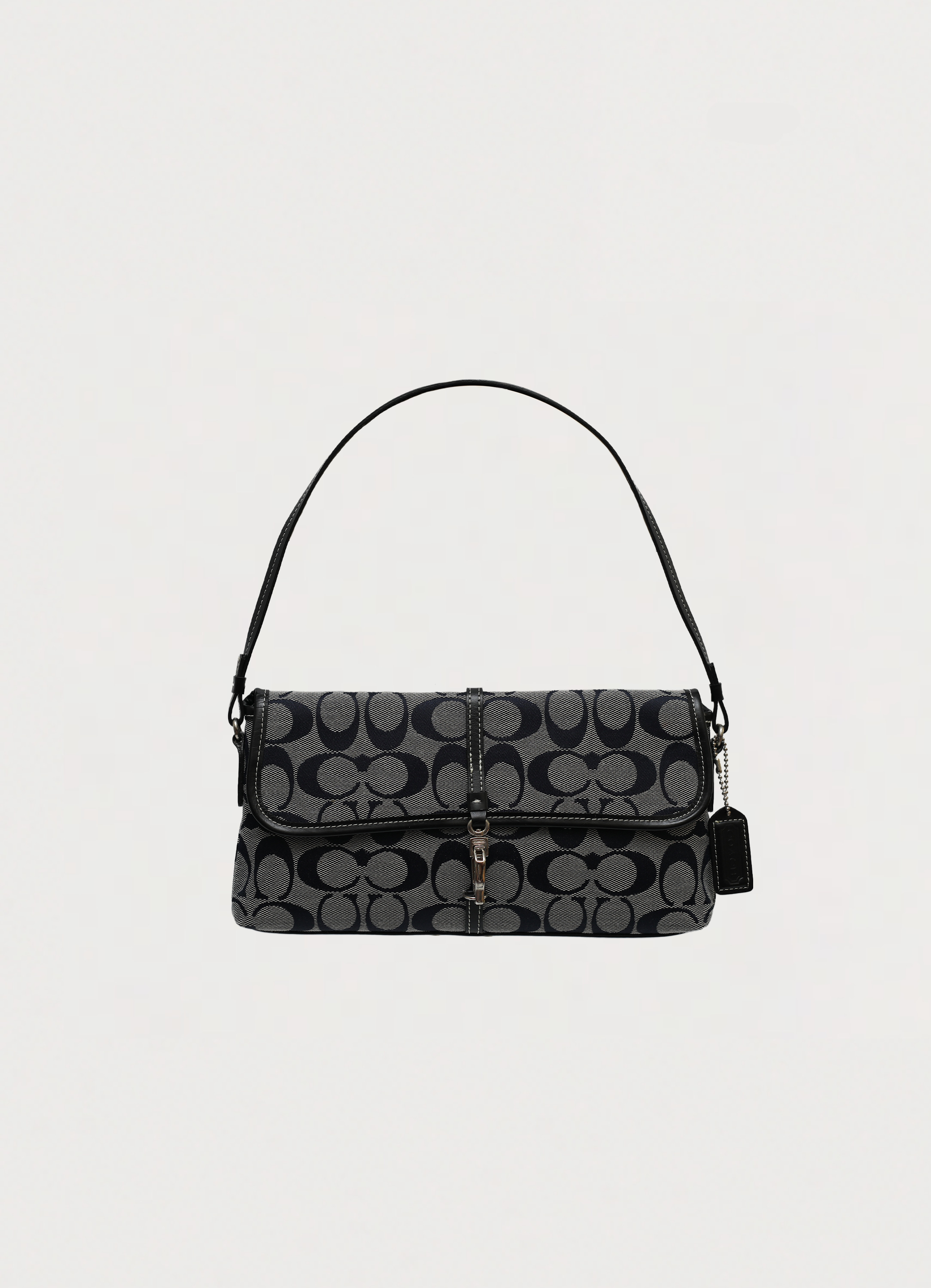 Coach signature demi flap bag in black and grey canvas with front lobster clip closure front view
