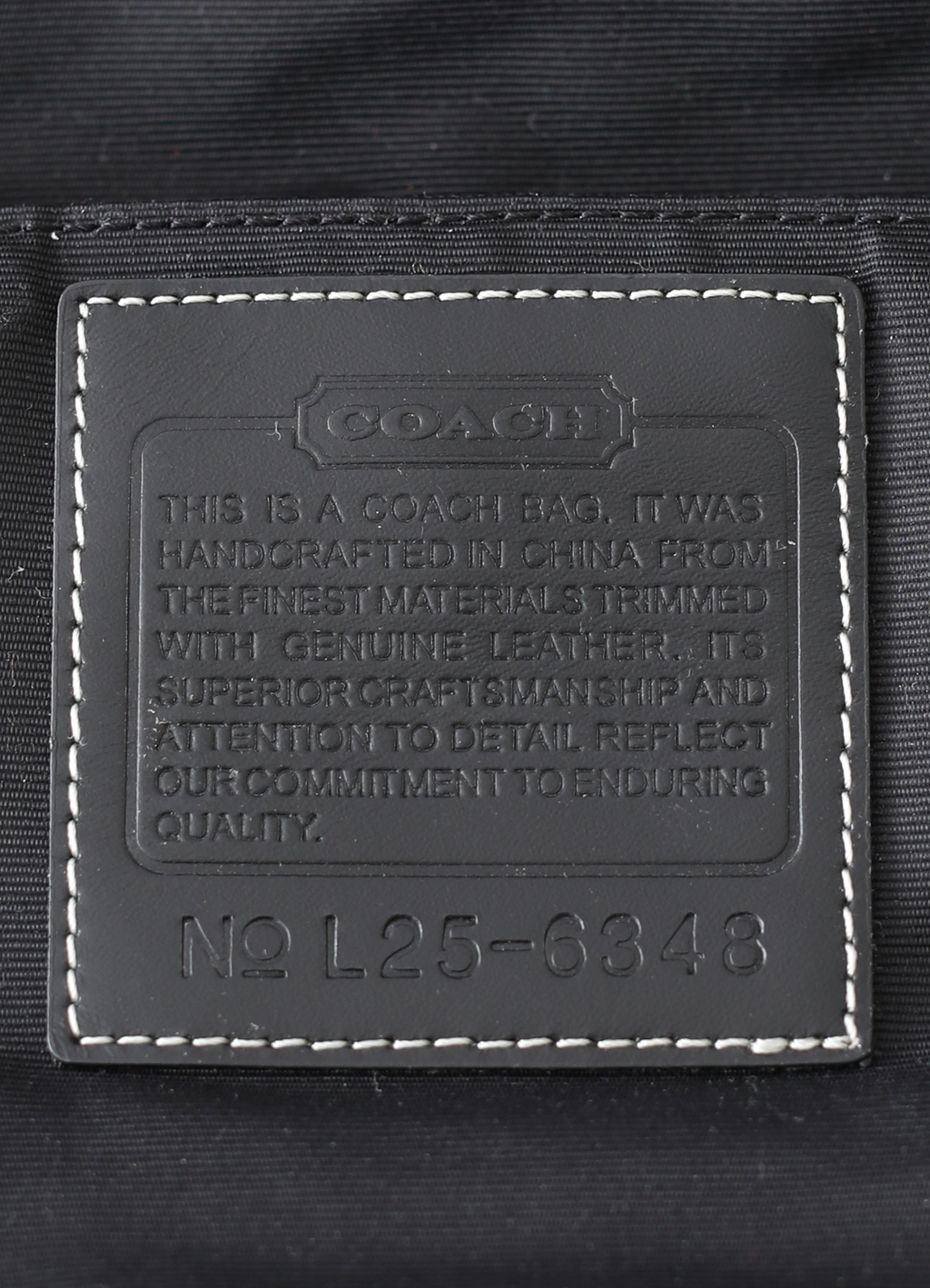 Interior leather Coach creed patch with serial number for authenticity
