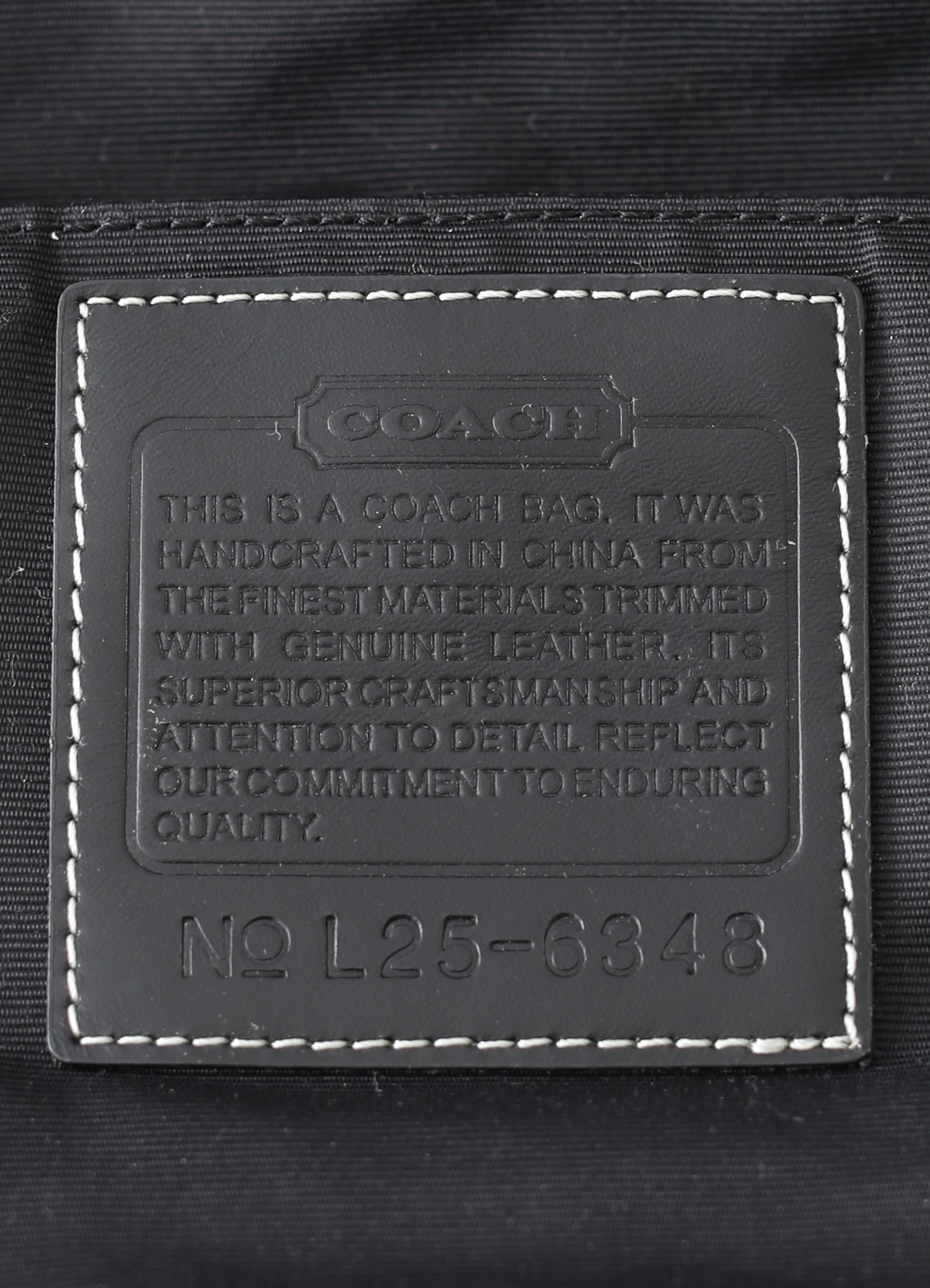 Interior leather Coach creed patch with serial number for authenticity