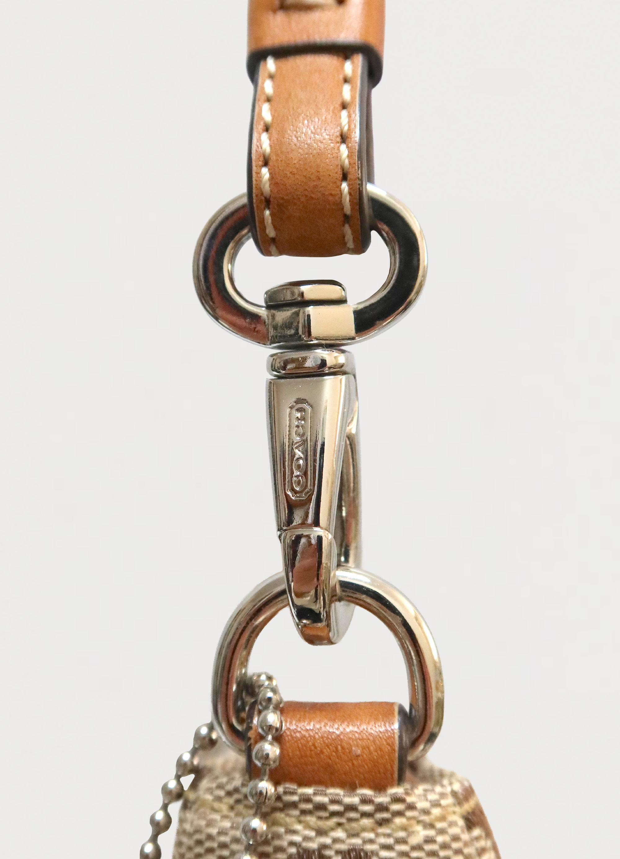 SIGNATURE DEMI POCHETTE BAG