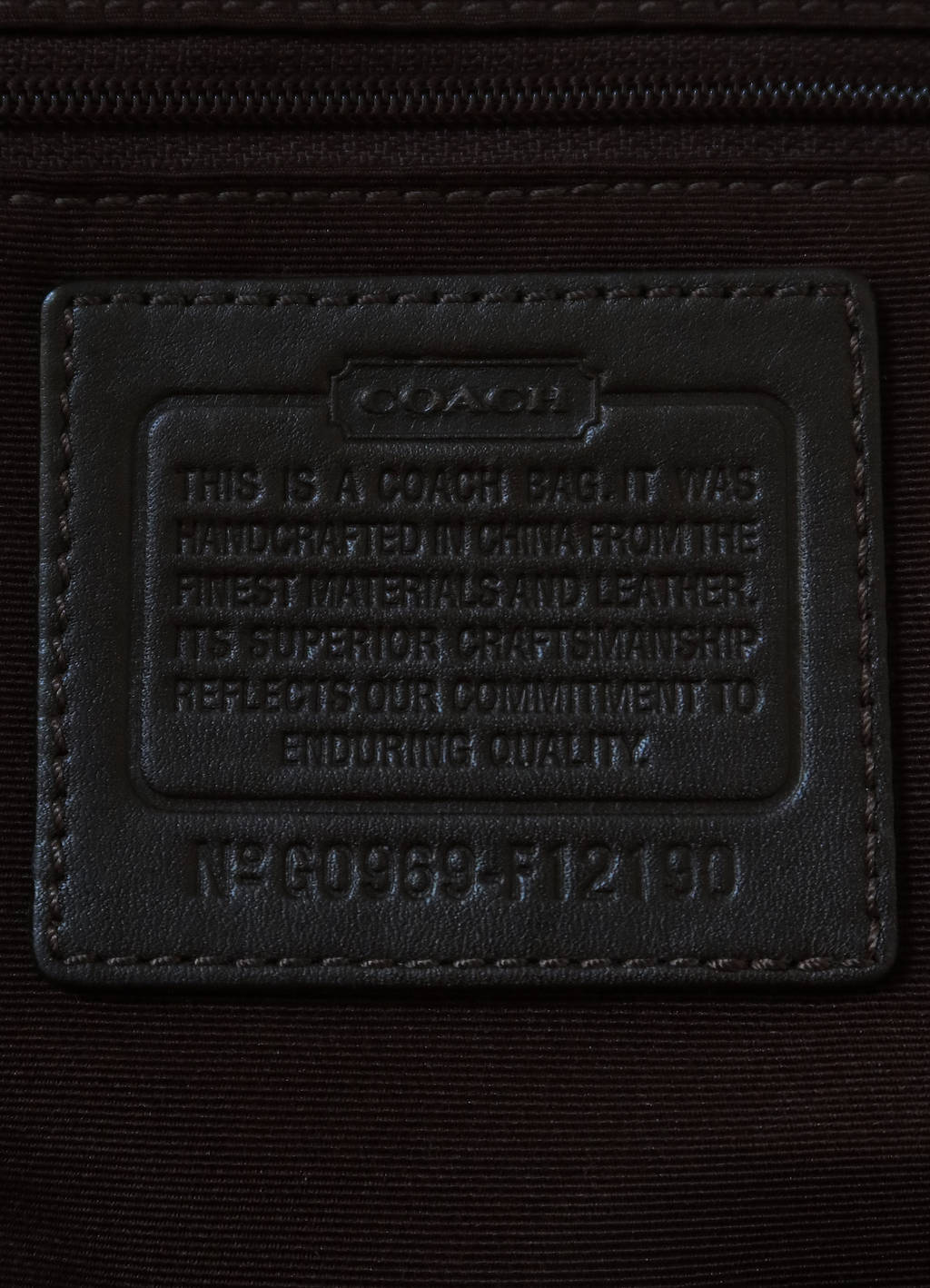 SIGNATURE CARLY TONAL HOBO BAG