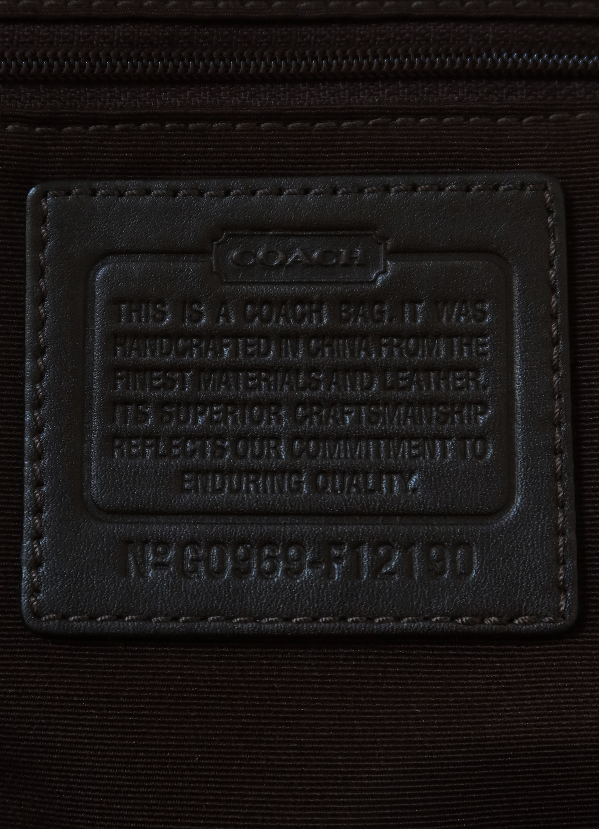 SIGNATURE CARLY TONAL HOBO BAG