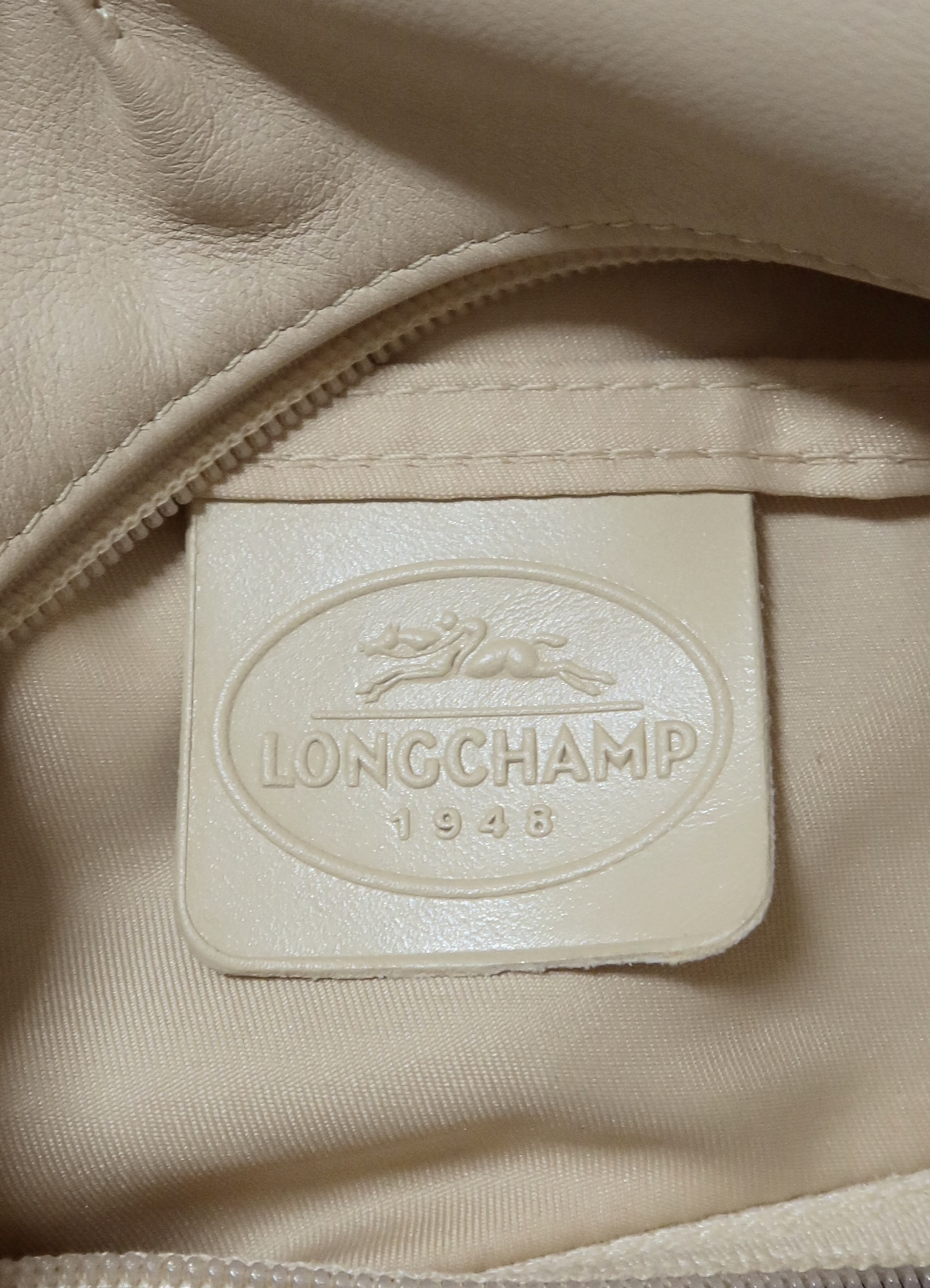 LE PILAGE ROSEAU KNOTTED HOBO BAG