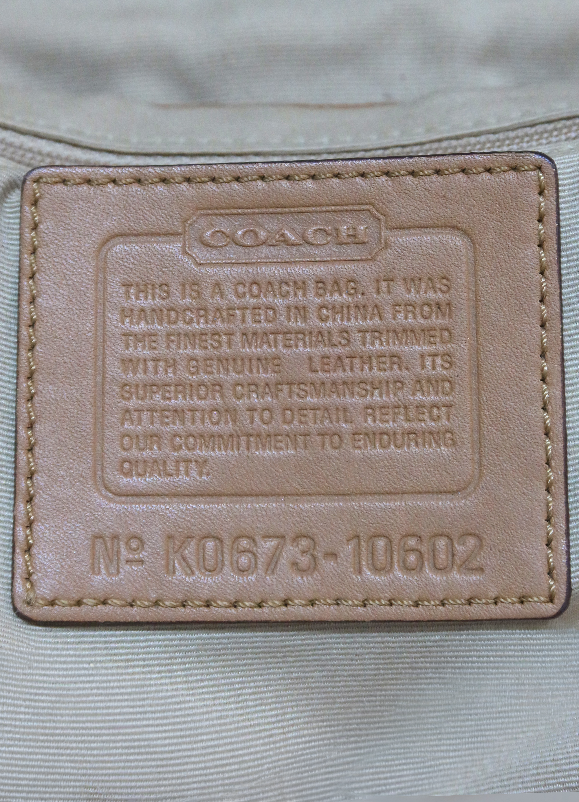 SIGNATURE SOHO BUCKLE FLAP SHOULDER BAG