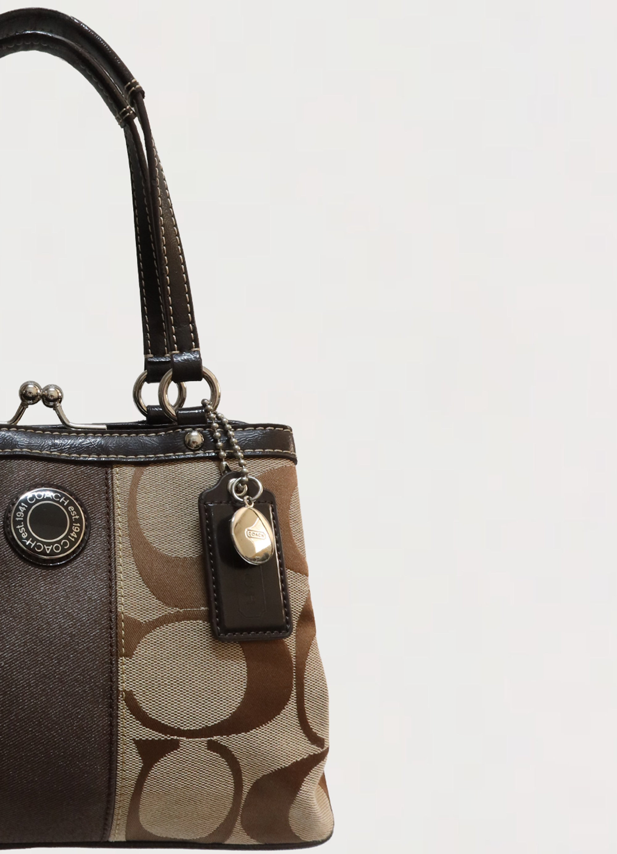 SIGNATURE STRIPE KISSLOCK SMALL HANDBAG