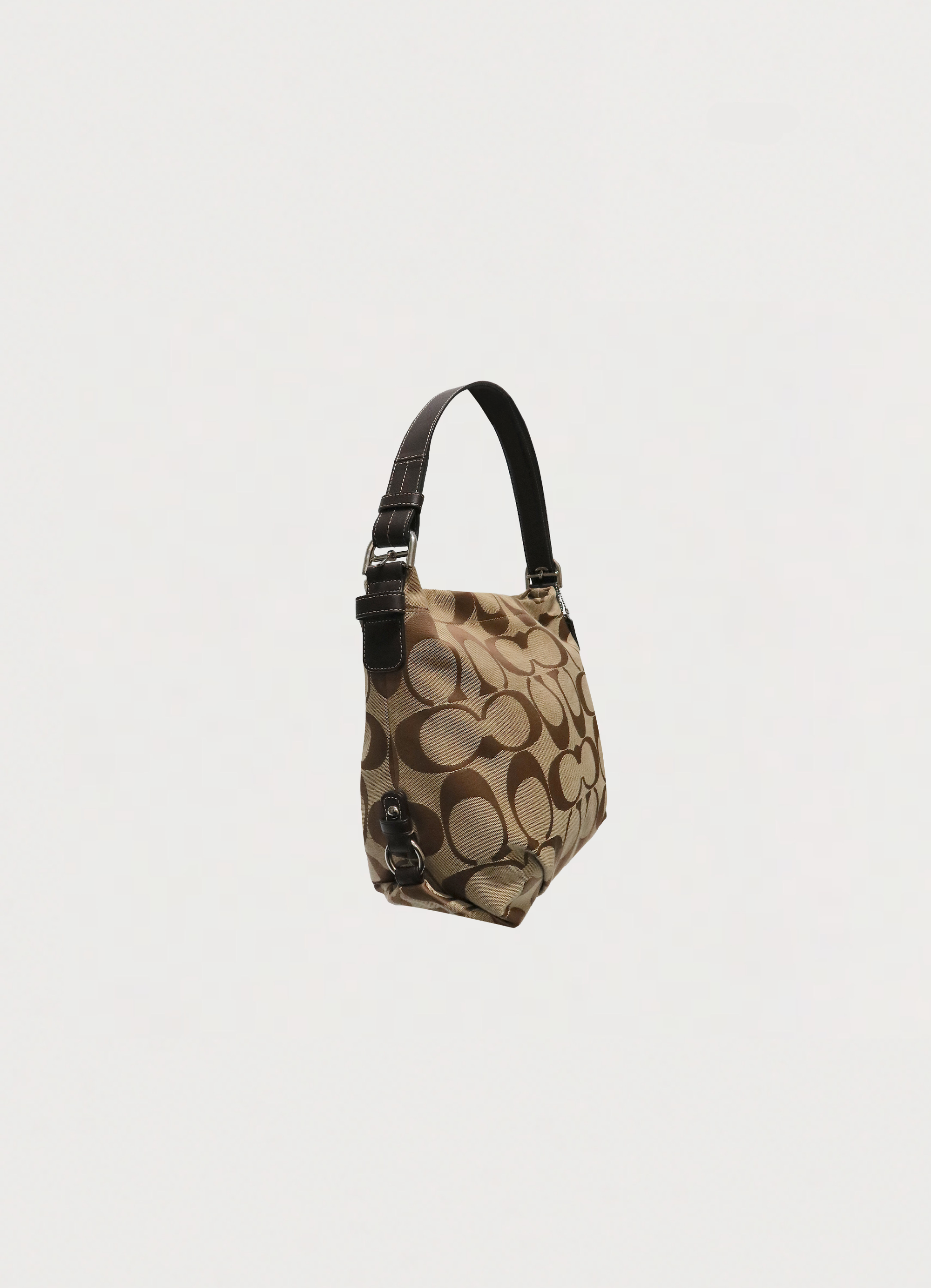 SIGNATURE DUFFLE CONVERTIBLE HOBO BAG