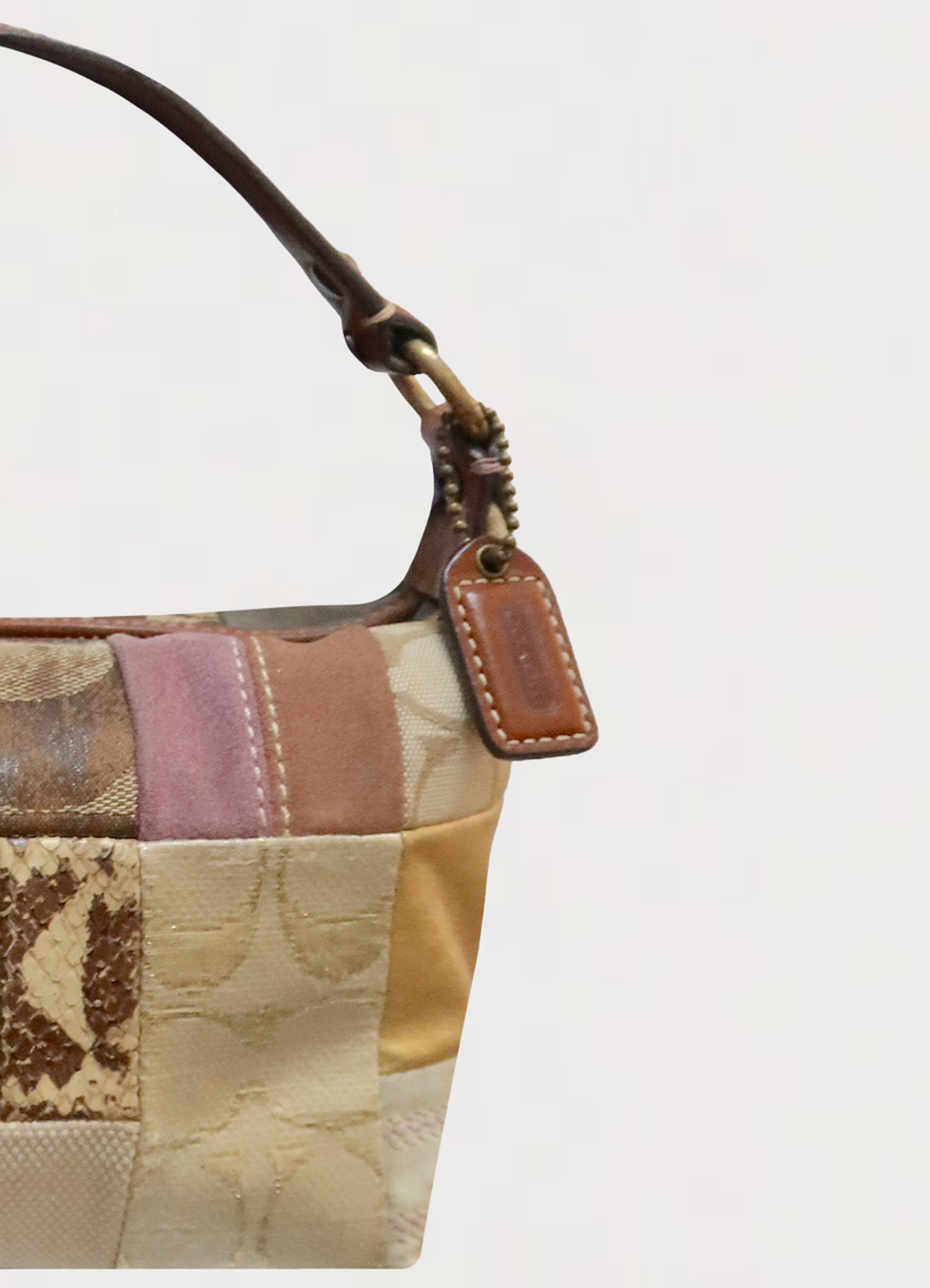 SIGNATURE PATCHWORK POCHETTE BAG