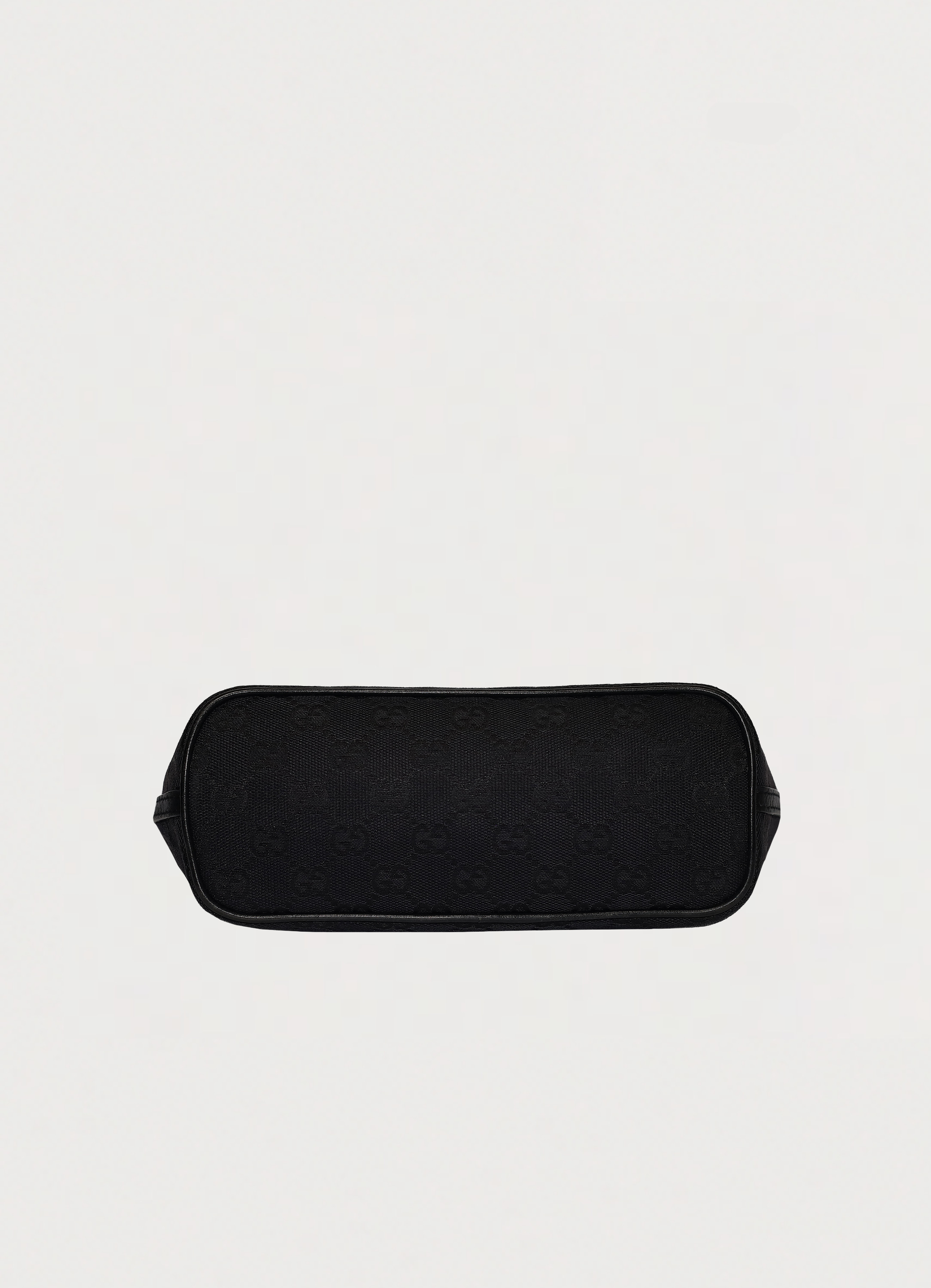 GG monogram boat back in black signature canvas with leather trim showing base