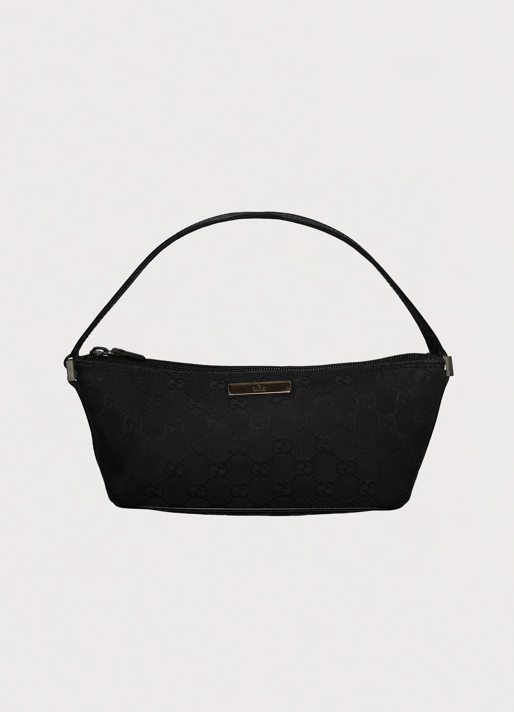 GG monogram boat back in black signature canvas with leather trim showing front