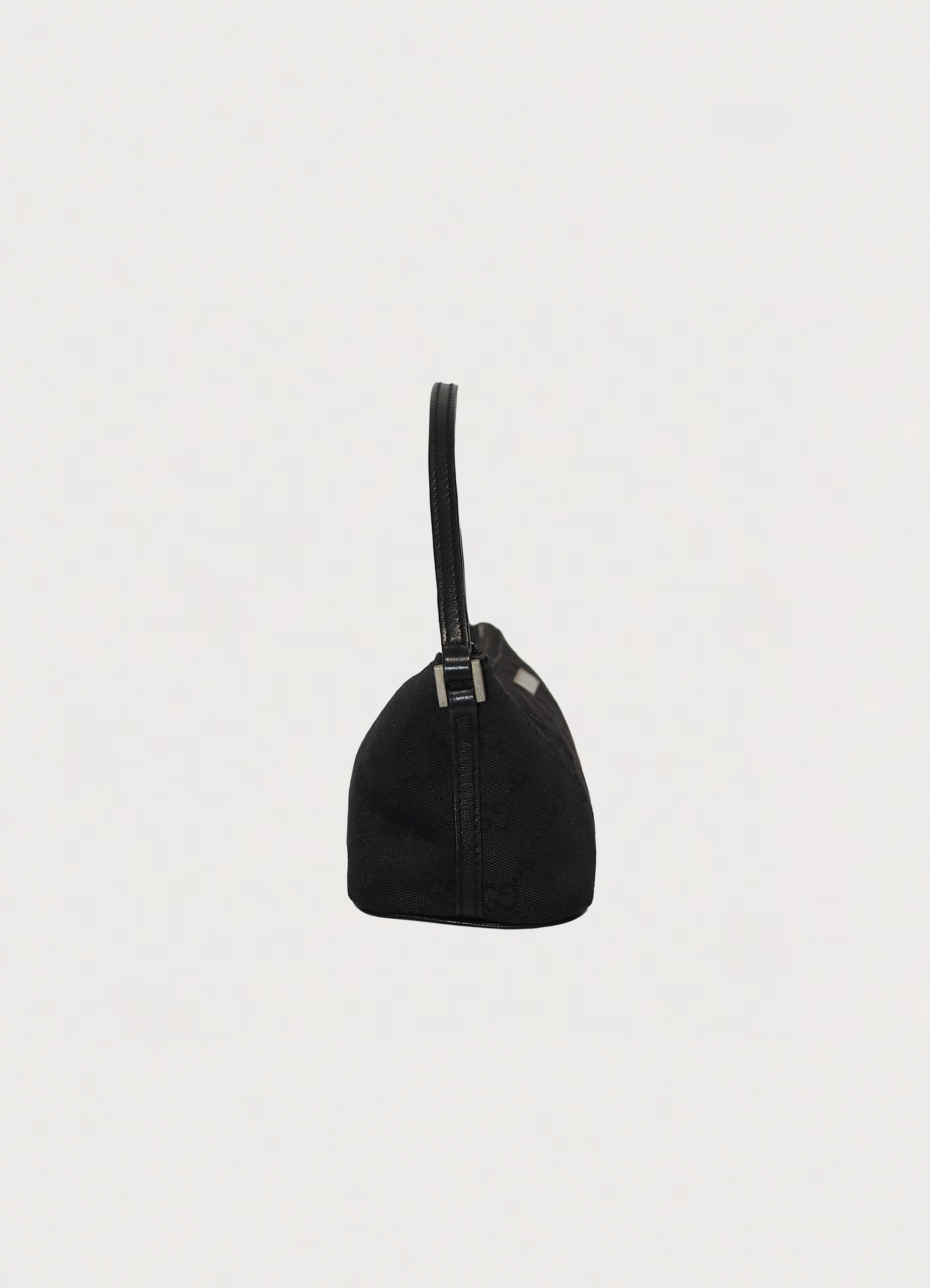 GG monogram boat back in black signature canvas with leather trim showing right side
