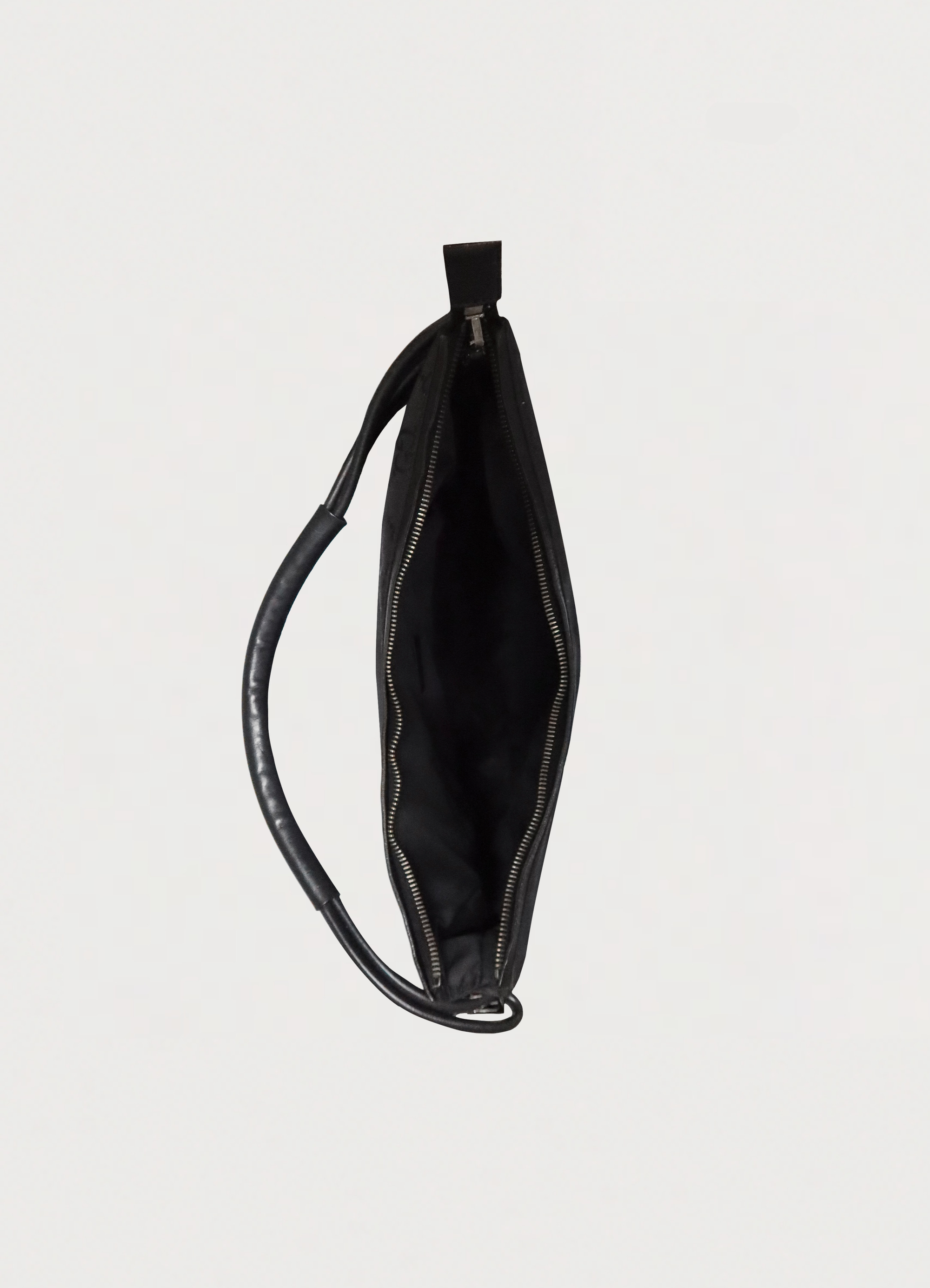 Gucci GG clasp hobo shoulder bag top view showing interior compartment