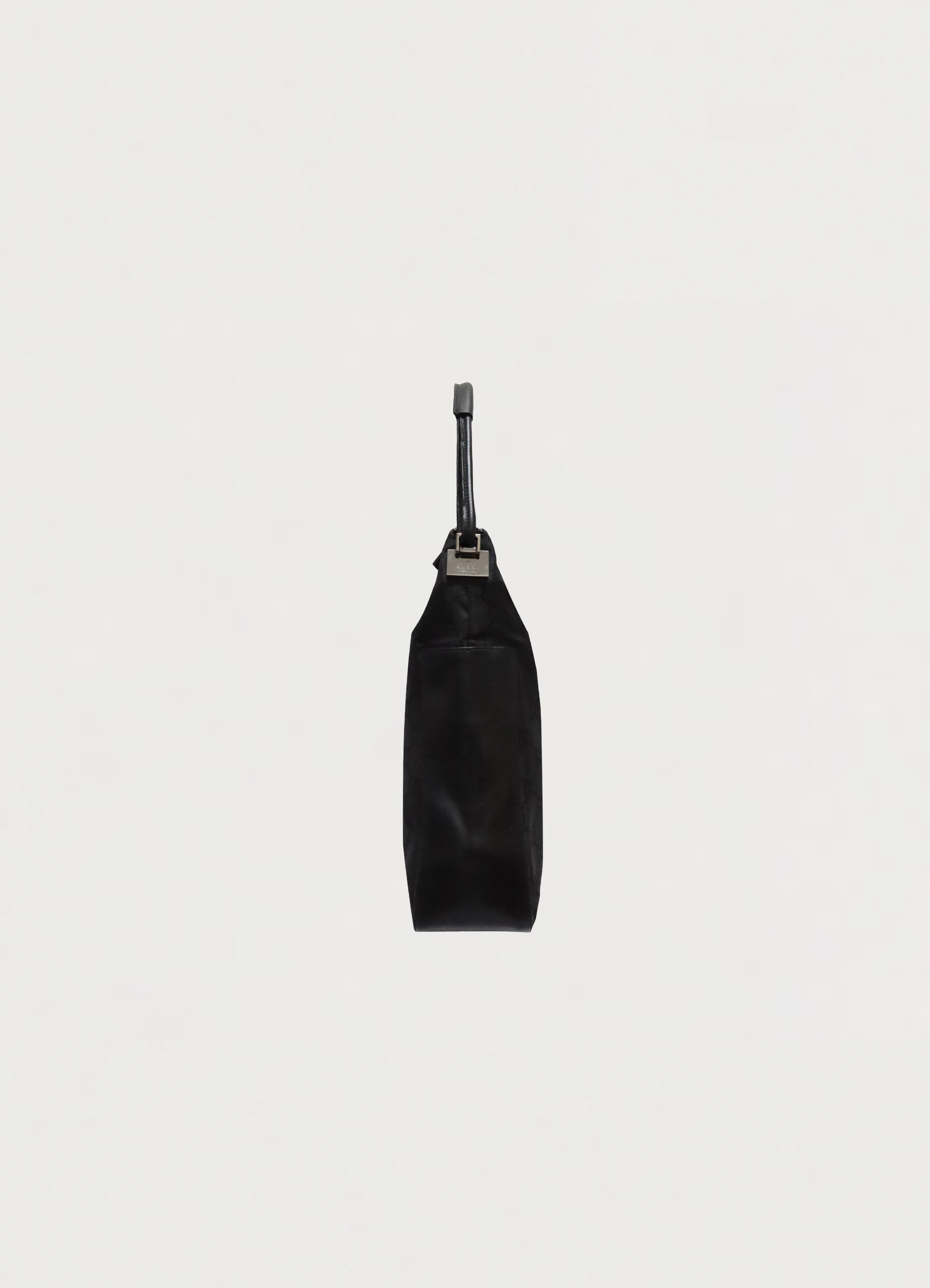 Gucci GG clasp hobo shoulder bag in black monogram canvas left side view