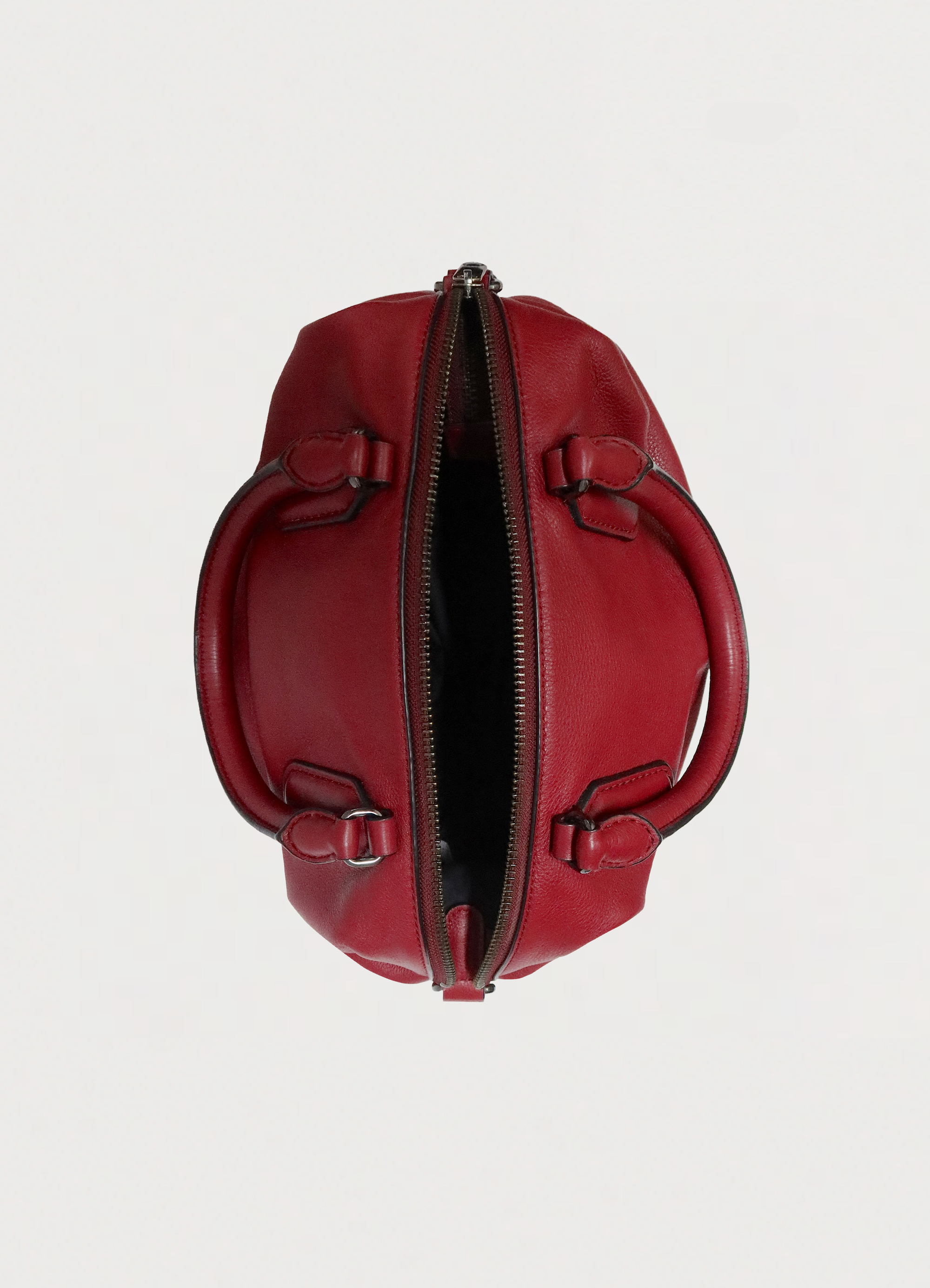 Top view of Marc by Marc Jacobs red satchel showing zipper opening