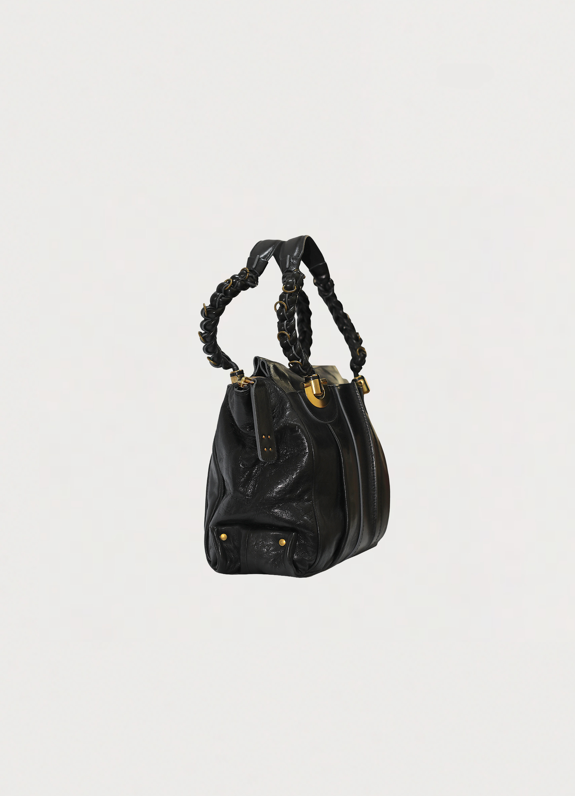 Vintage Chloé Héloïse tote bag in black leather showing angled side