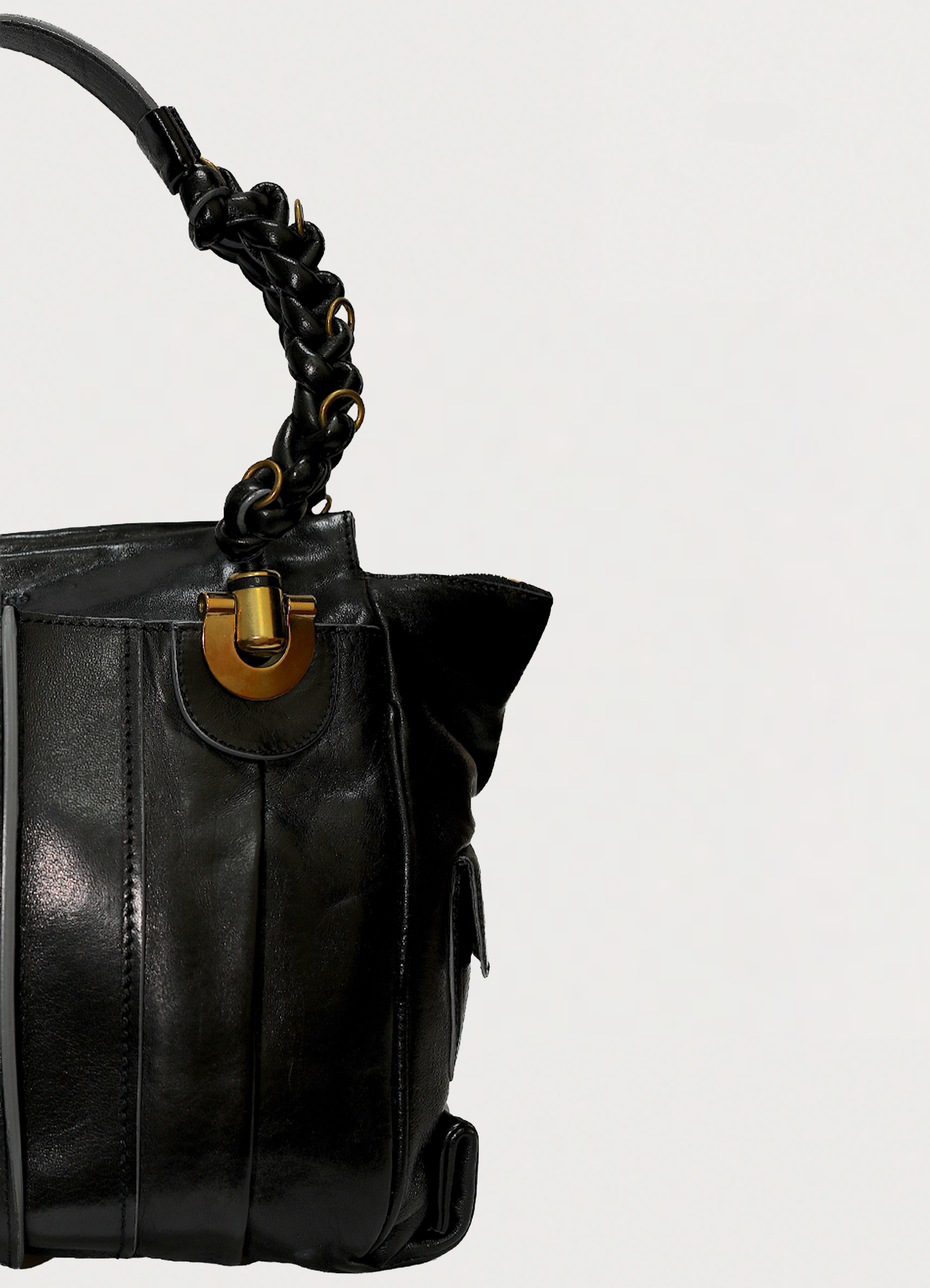 Vintage Chloe Heloise tote bag in black leather showing close up of left side