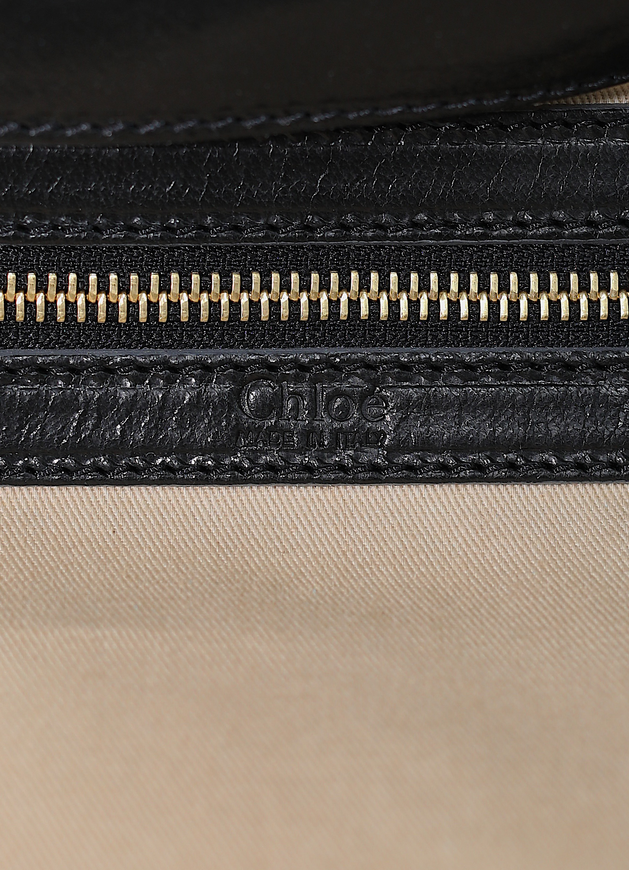 Vintage Chloe Heloise tote bag in black leather showing close up of embossed label