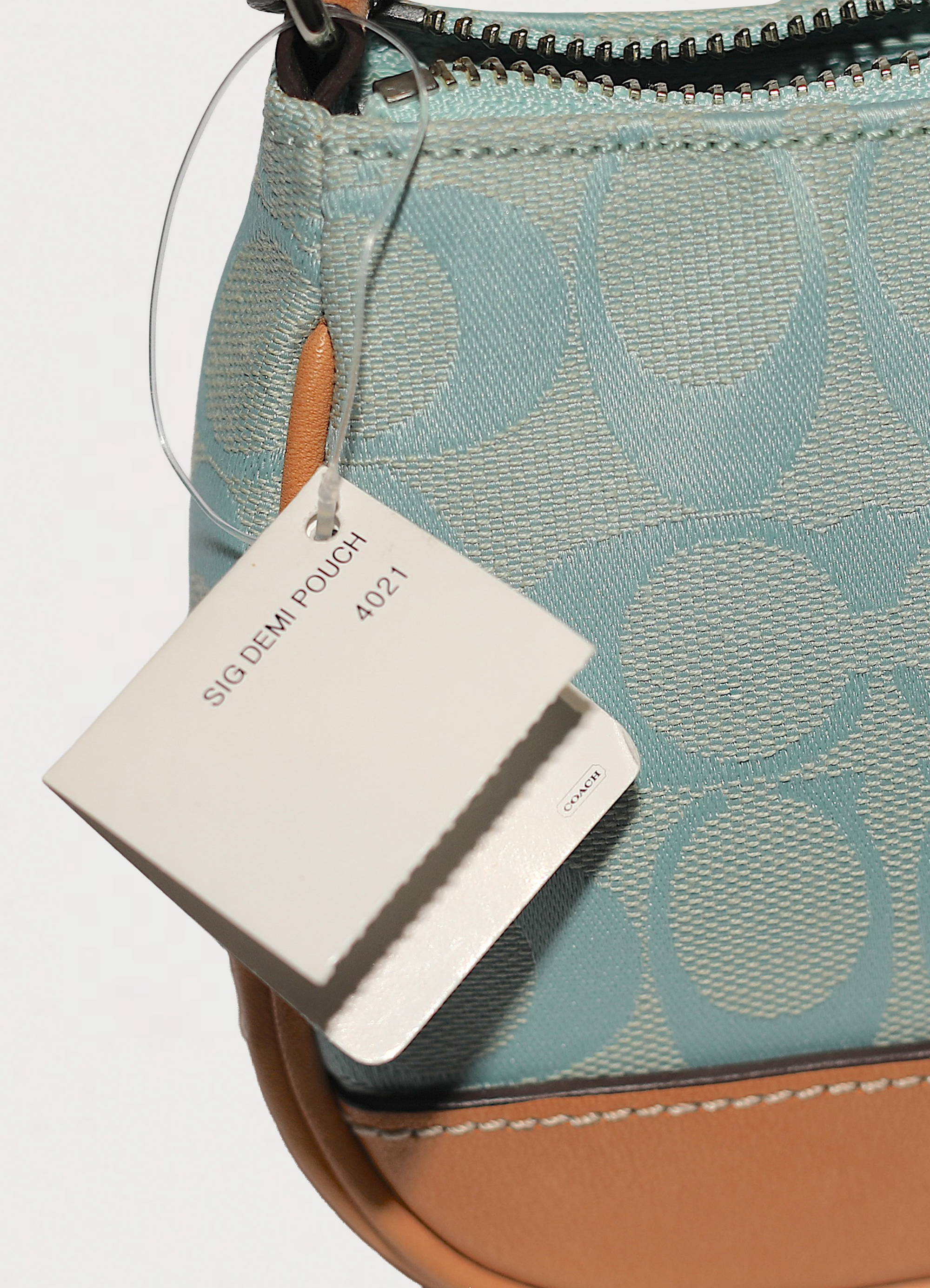 Vintage Coach Demi pochette bag in turquoise signature canvas with leather trim