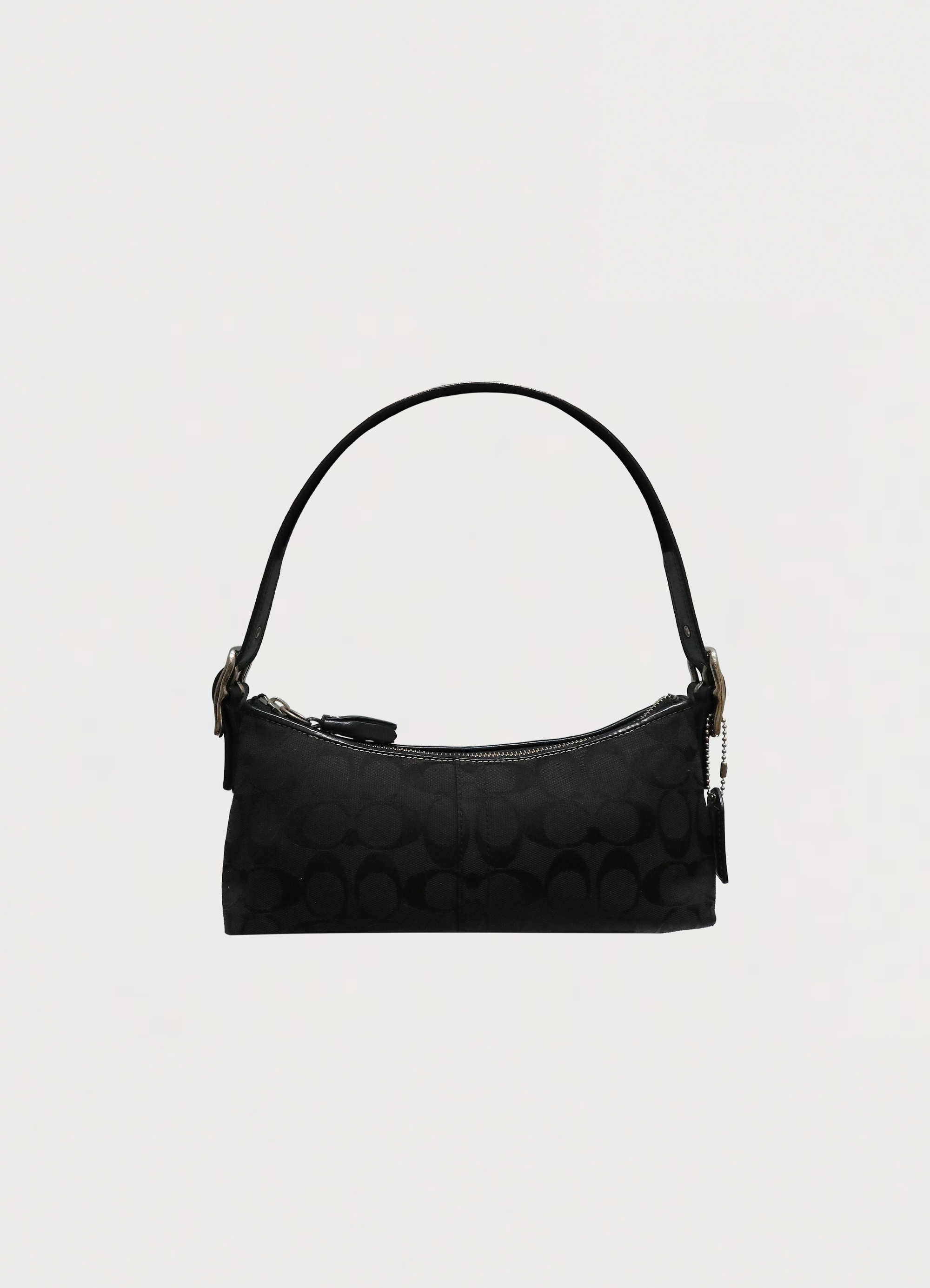 Vintage Coach East West demi baguette bag in black signature canvas front view
