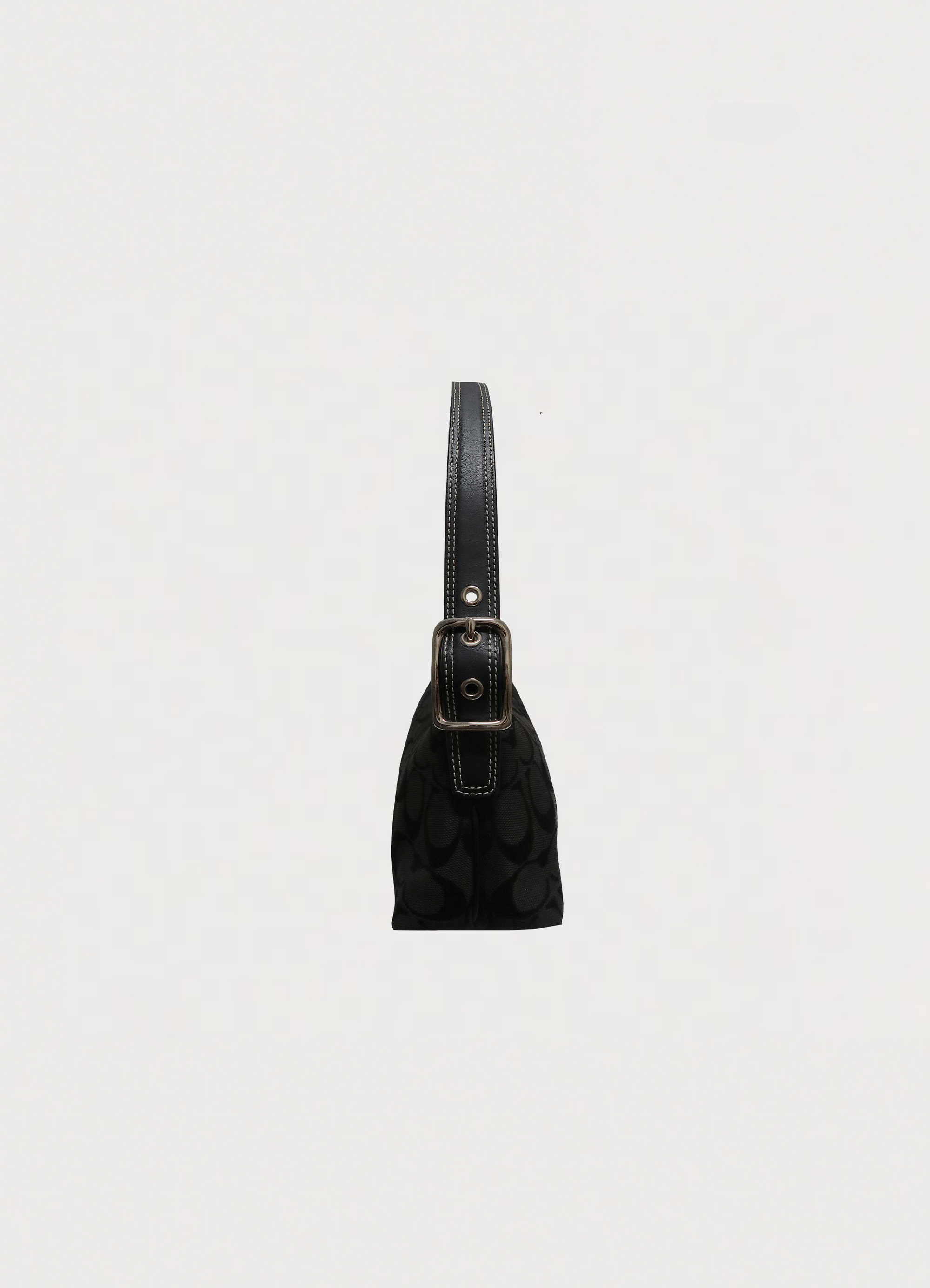 Vintage Coach East West demi baguette bag in black signature canvas left side view