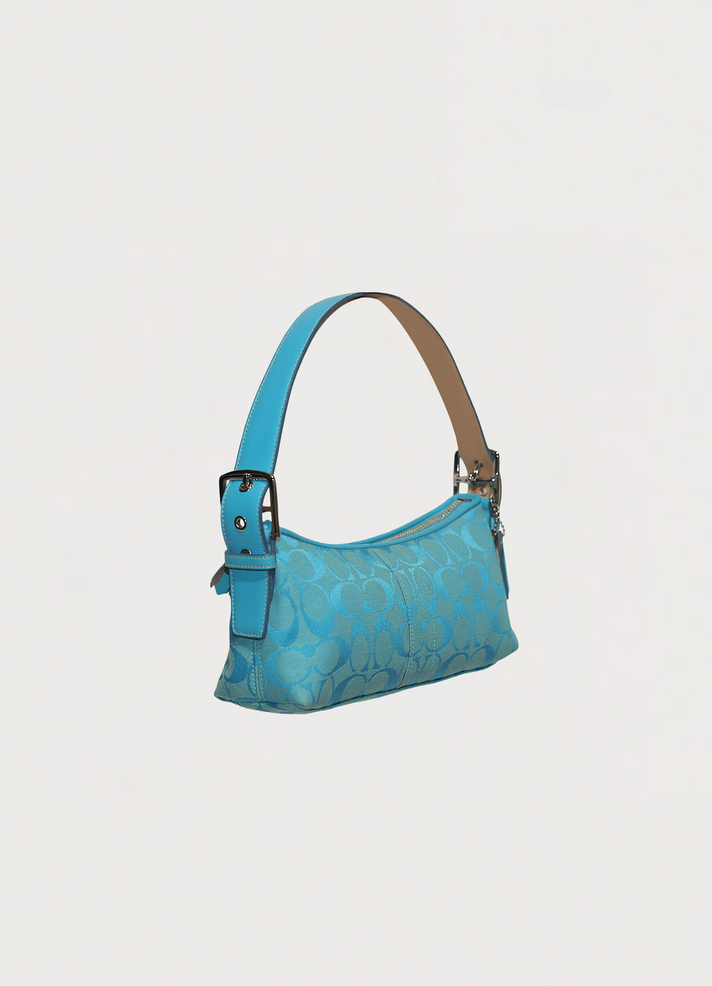 Vintage Coach East West demi bag in blue signature canvas with leather trim showing angled side